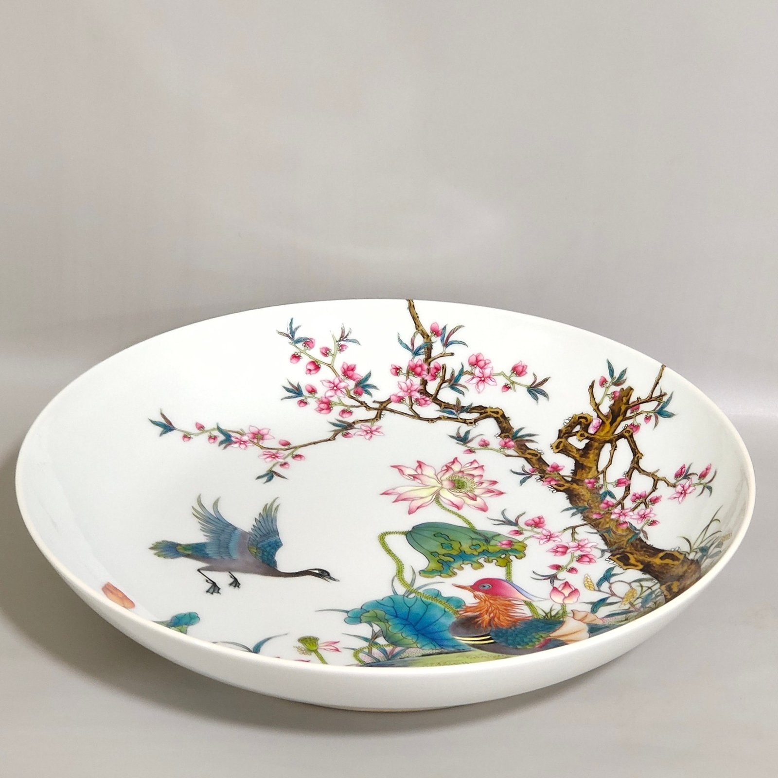 Qing Dynasty Yongzheng Lotus and mandarin duck on a branch plate