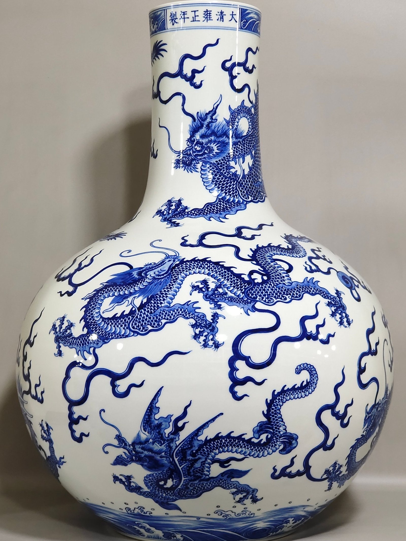 Qing Dynasty Yongzheng blue and white Kowloon Sea Map celestial vase