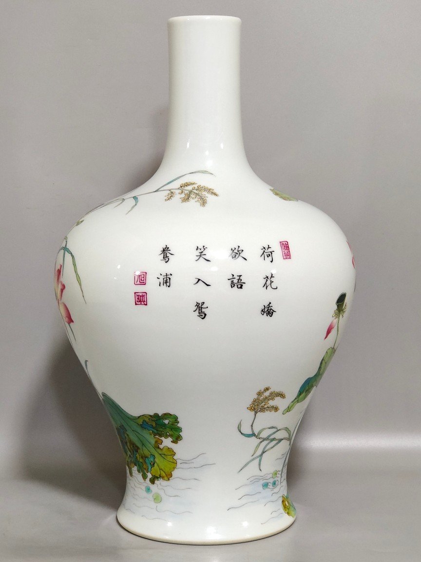 Qing Dynasty Yongzheng mandarin ducks playing in the water and lotus poems on the vase