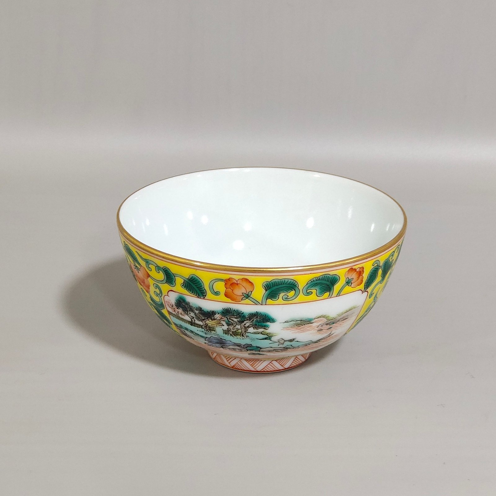 Qing Dynasty Yongzheng yellow ground window landscape cup