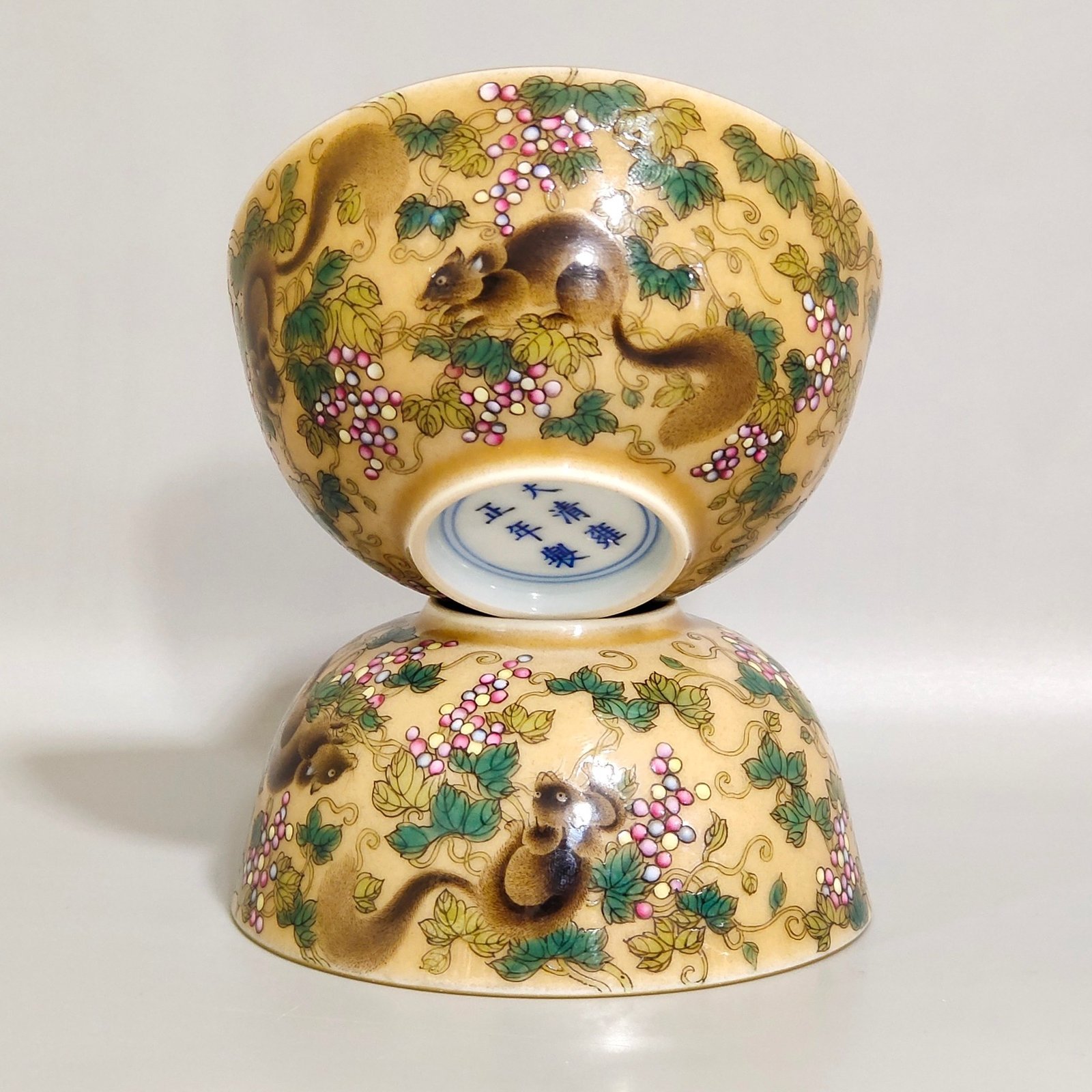 Qing Dynasty Yongzheng yellow-glazed squirrel grape cup