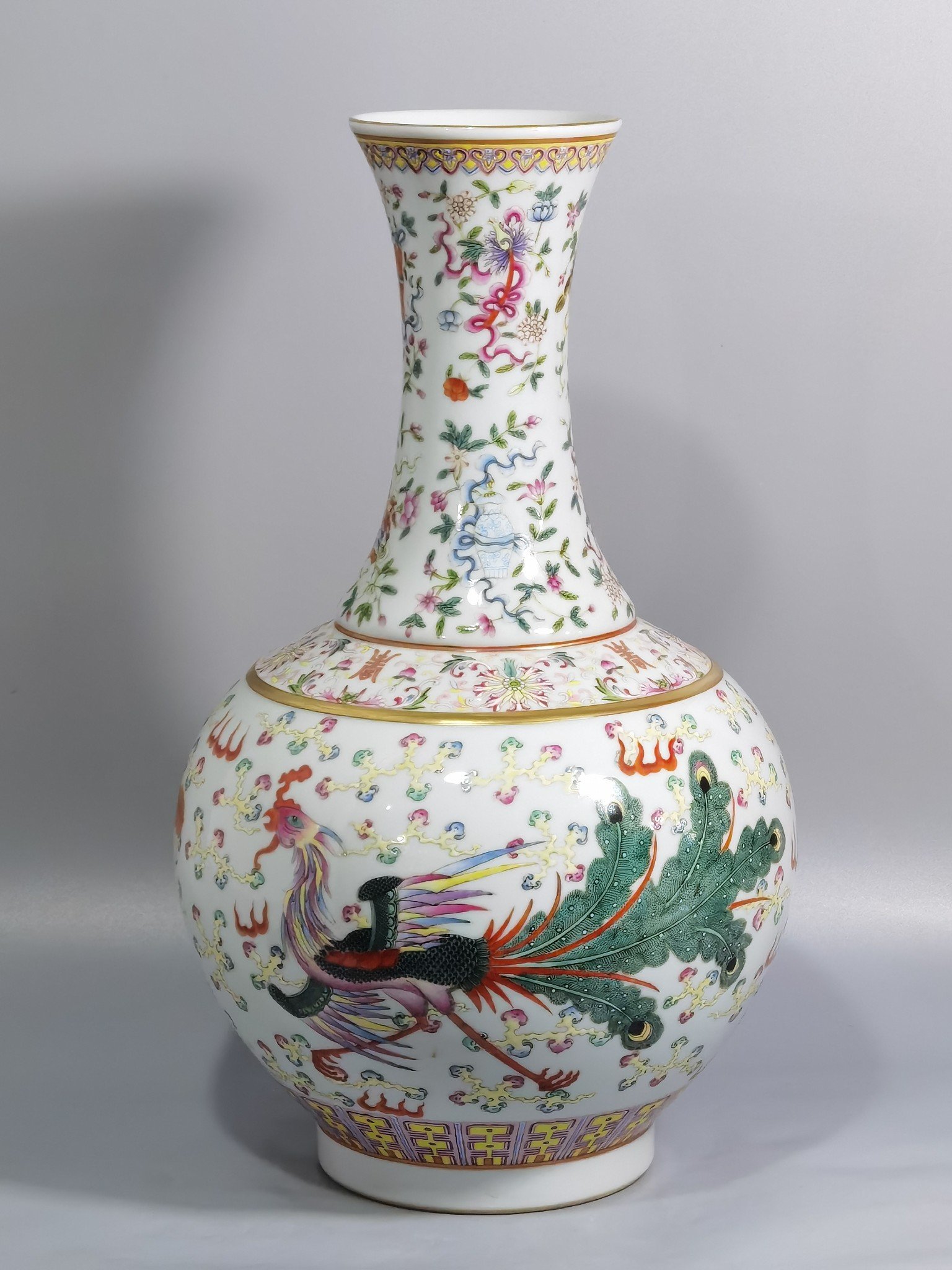 Qing Dynasty Guangxu famille rose vase with eight treasures dragons and phoenixes in auspicious patterns
