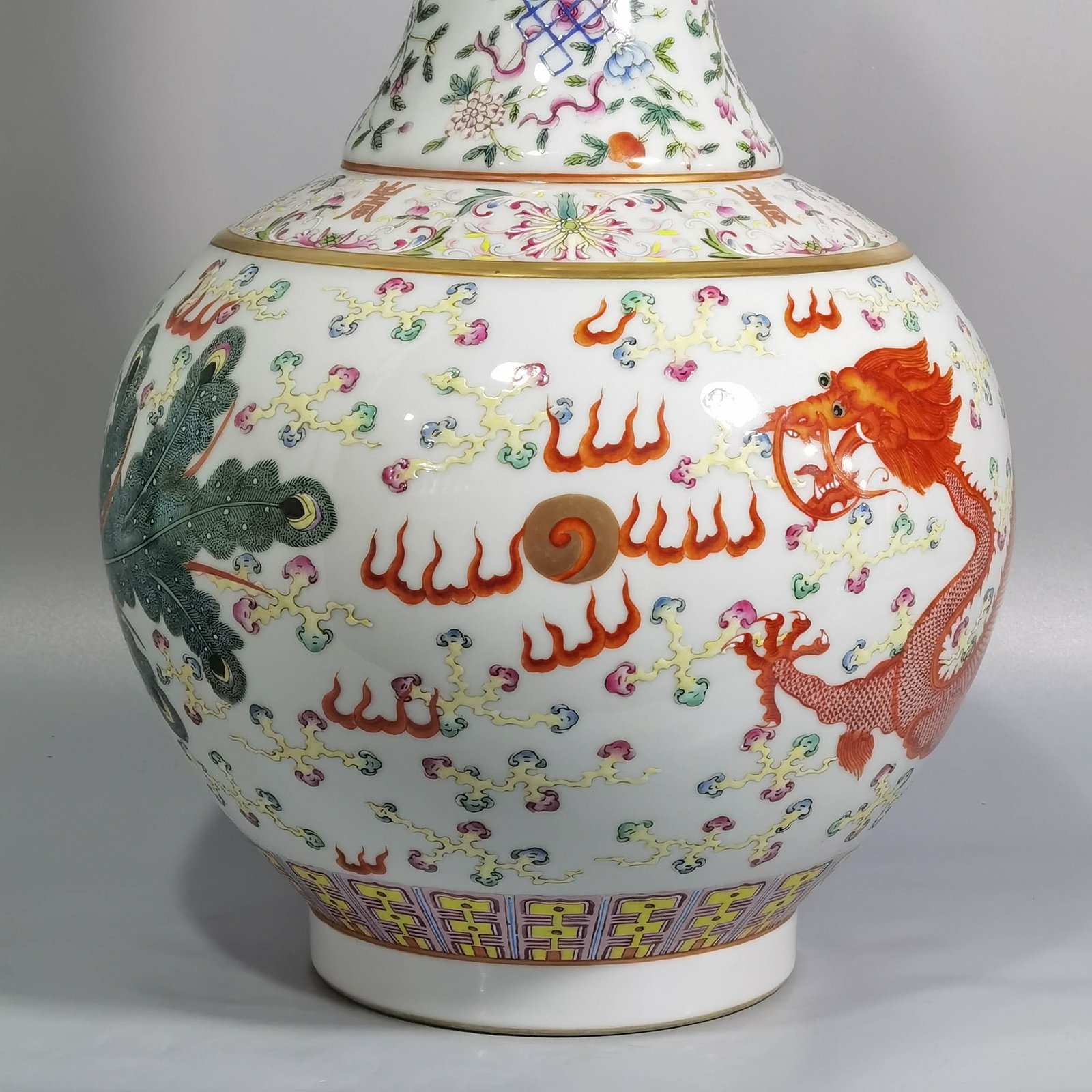 Qing Dynasty Guangxu famille rose vase with eight treasures dragons and phoenixes in auspicious patterns