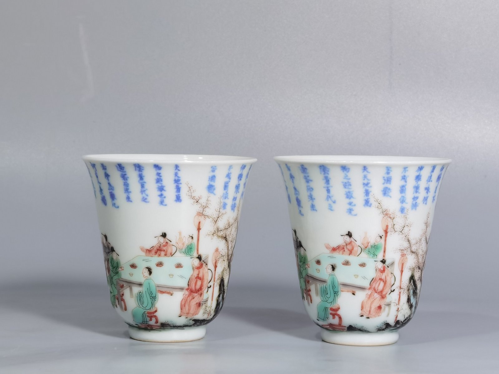Qing Dynasty Kangxi blue and white colorful spring night banquet peach and plum garden poetry bell cup