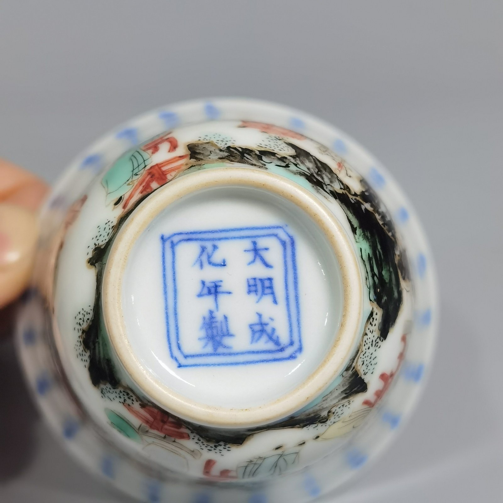 Qing Dynasty Kangxi blue and white colorful spring night banquet peach and plum garden poetry bell cup