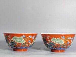 Qing Dynasty Yongzheng A pair of enamel-colored coral red ground nine-autumn bowls