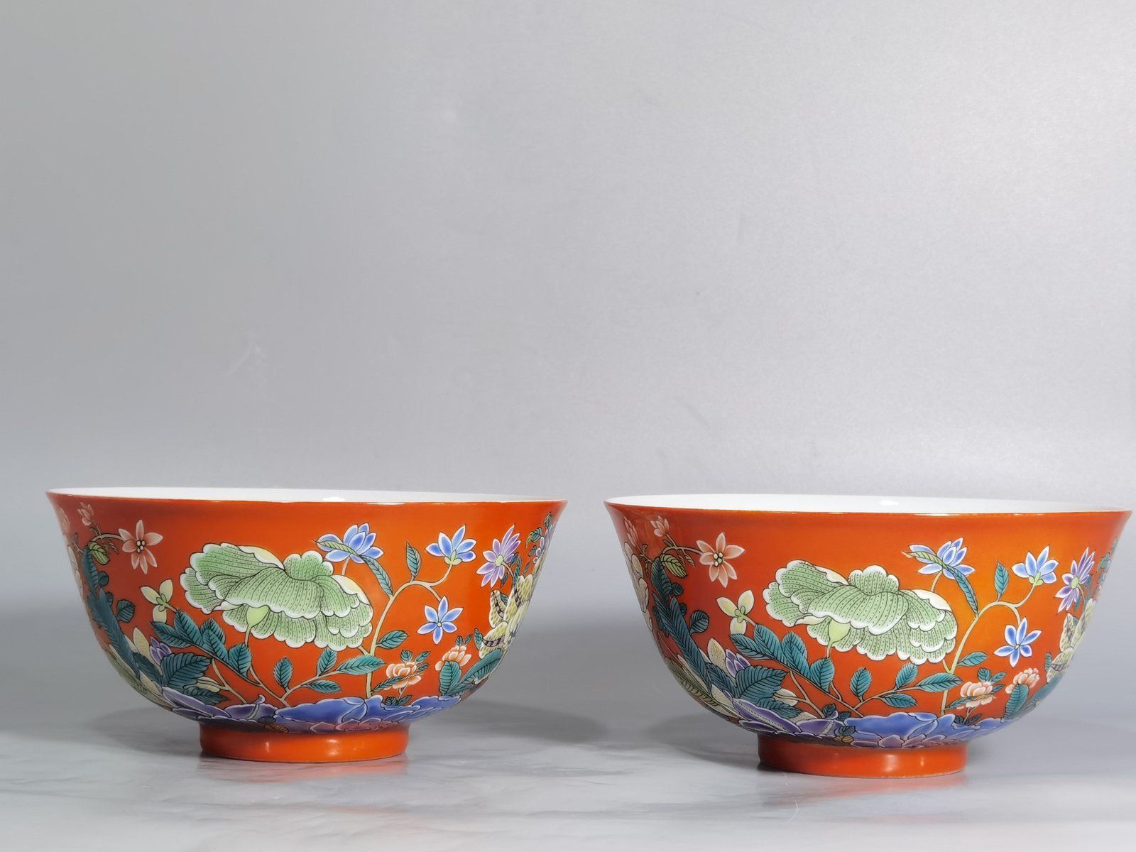 Qing Dynasty Yongzheng A pair of enamel-colored coral red ground nine-autumn bowls