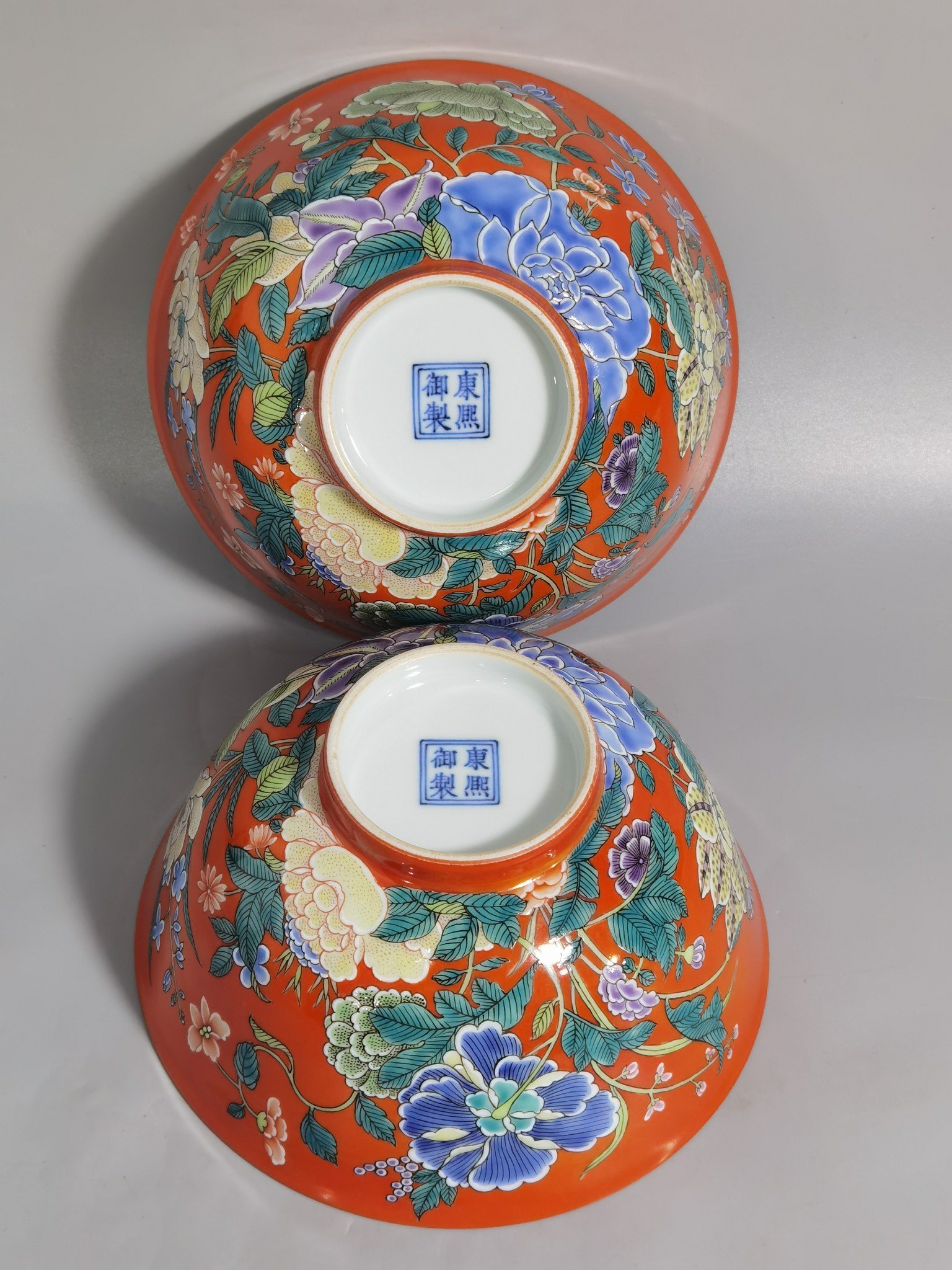 Qing Dynasty Yongzheng A pair of enamel-colored coral red ground nine-autumn bowls