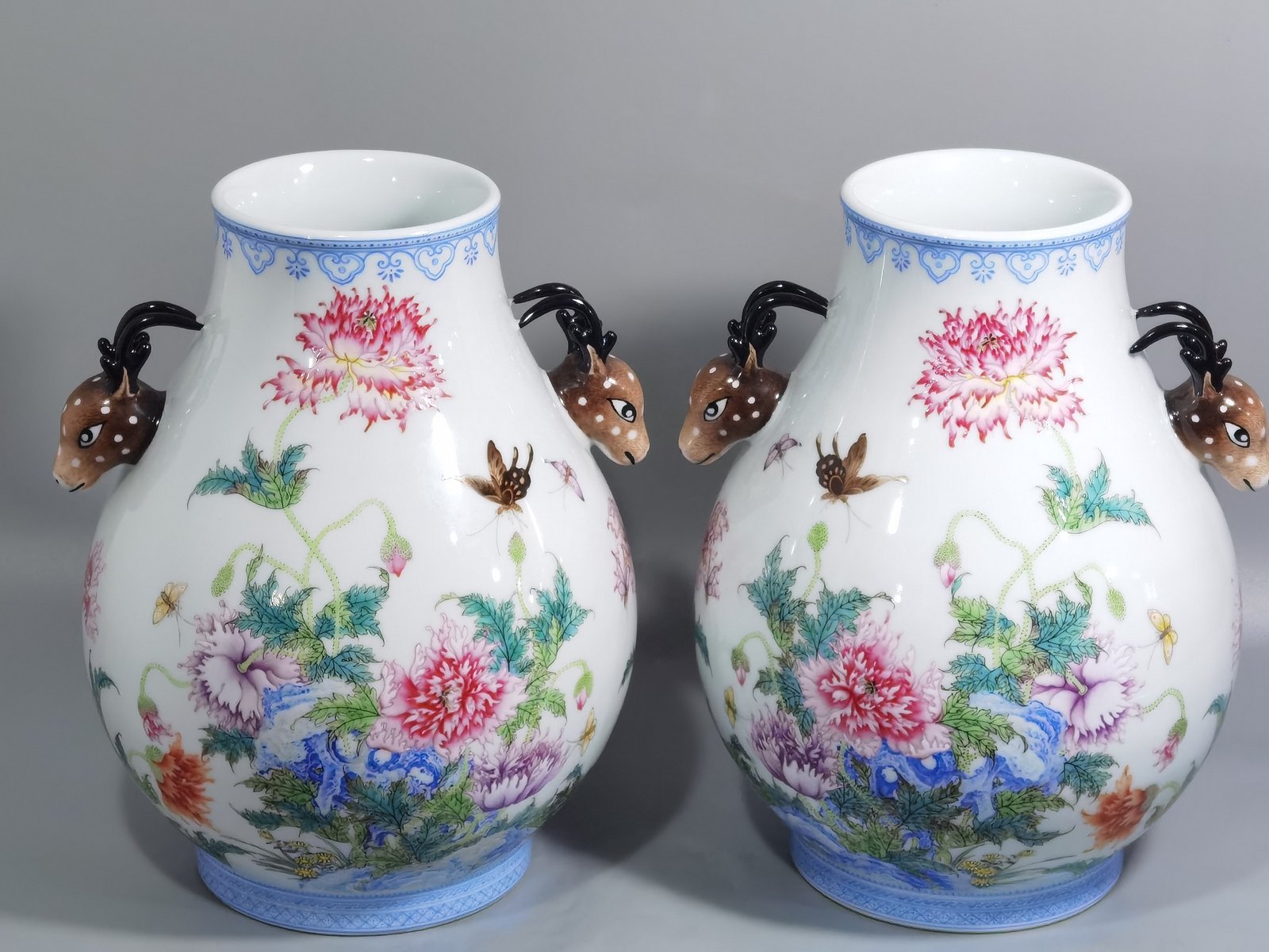 Qing Dynasty Yongzheng a pastel poppy-inscribed deer-headed statue