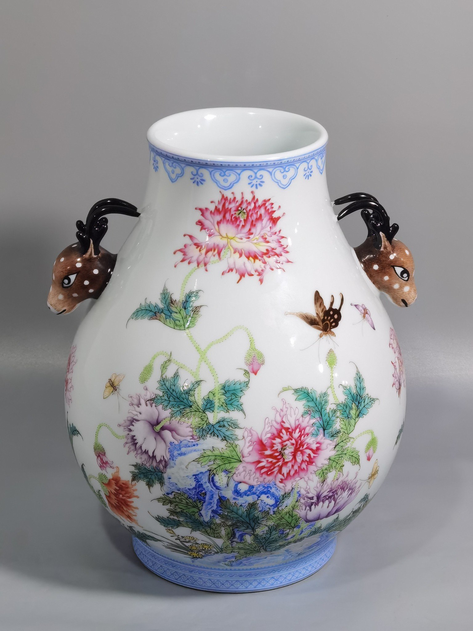 Qing Dynasty Yongzheng a pastel poppy-inscribed deer-headed statue