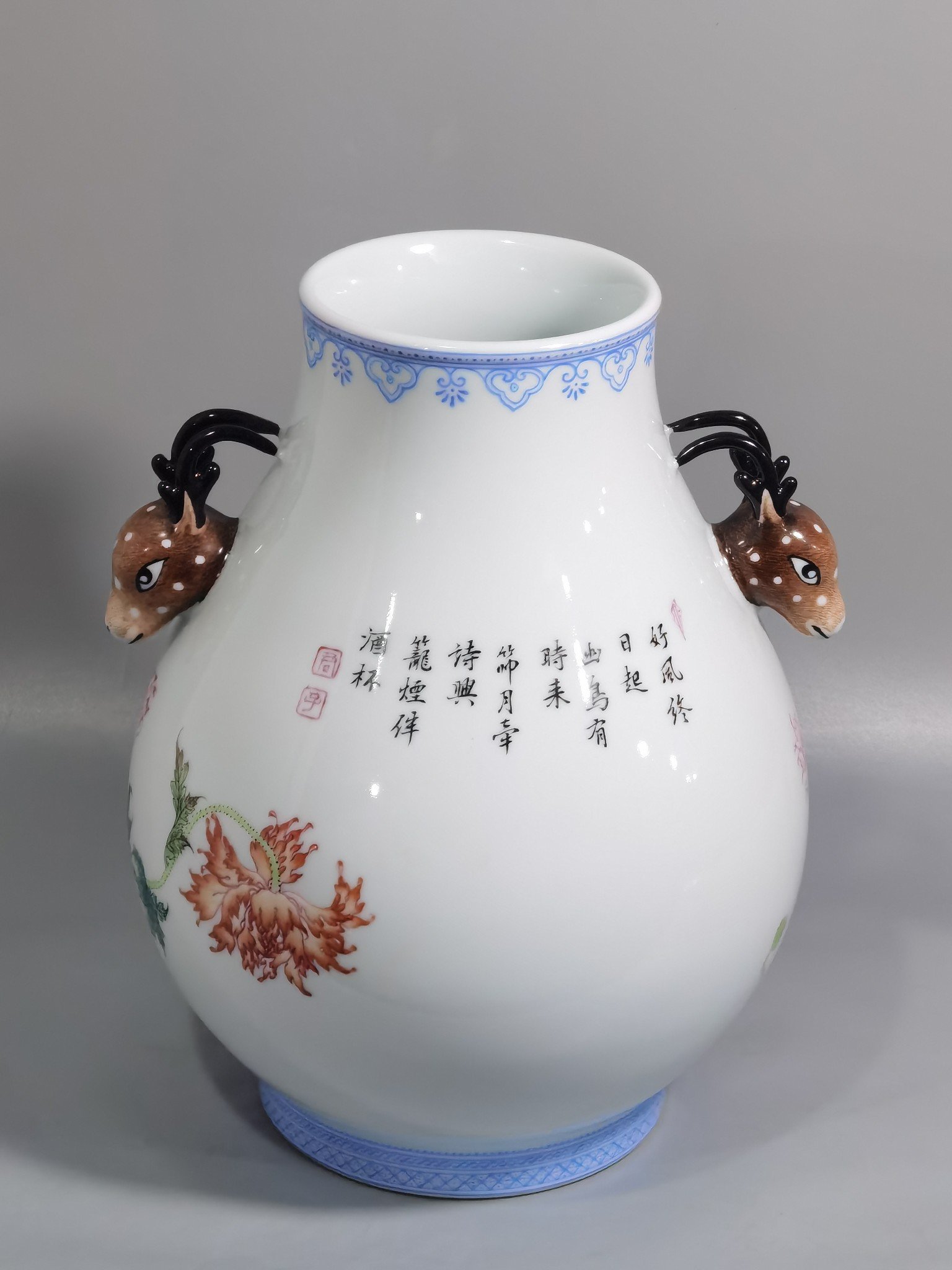 Qing Dynasty Yongzheng a pastel poppy-inscribed deer-headed statue