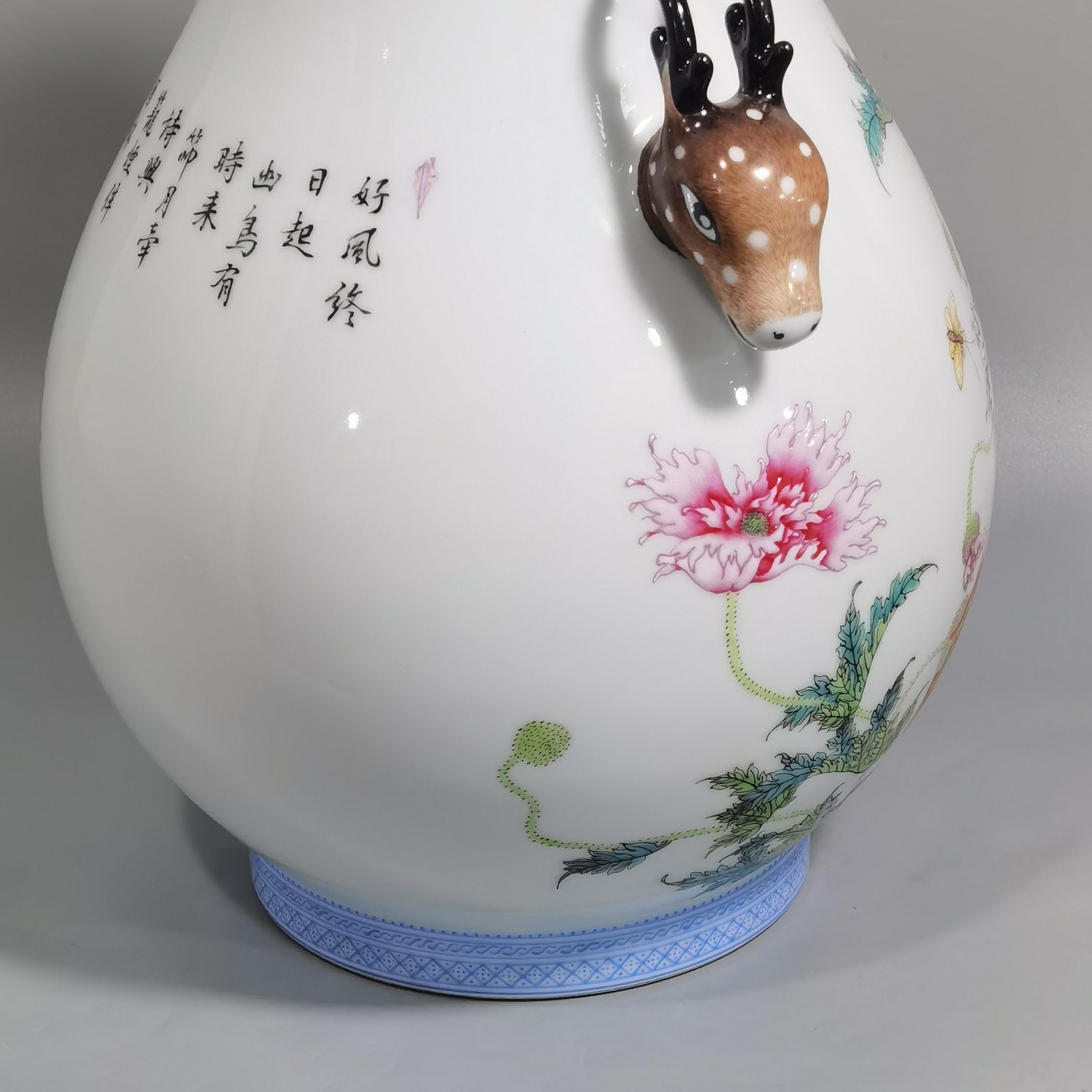 Qing Dynasty Yongzheng a pastel poppy-inscribed deer-headed statue