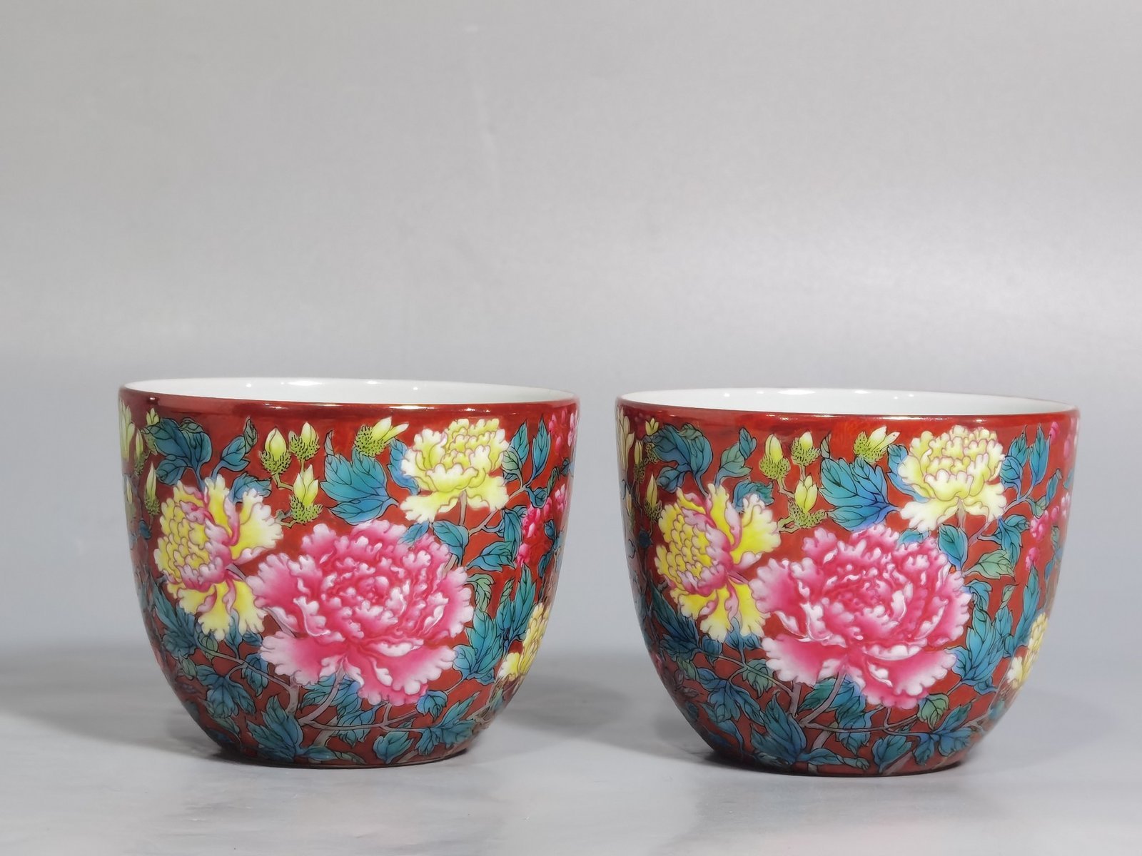 Qing Dynasty Yongzheng a pair of coral red pastel peony flower cups