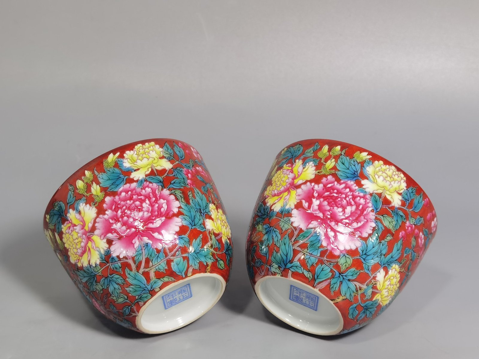 Qing Dynasty Yongzheng a pair of coral red pastel peony flower cups