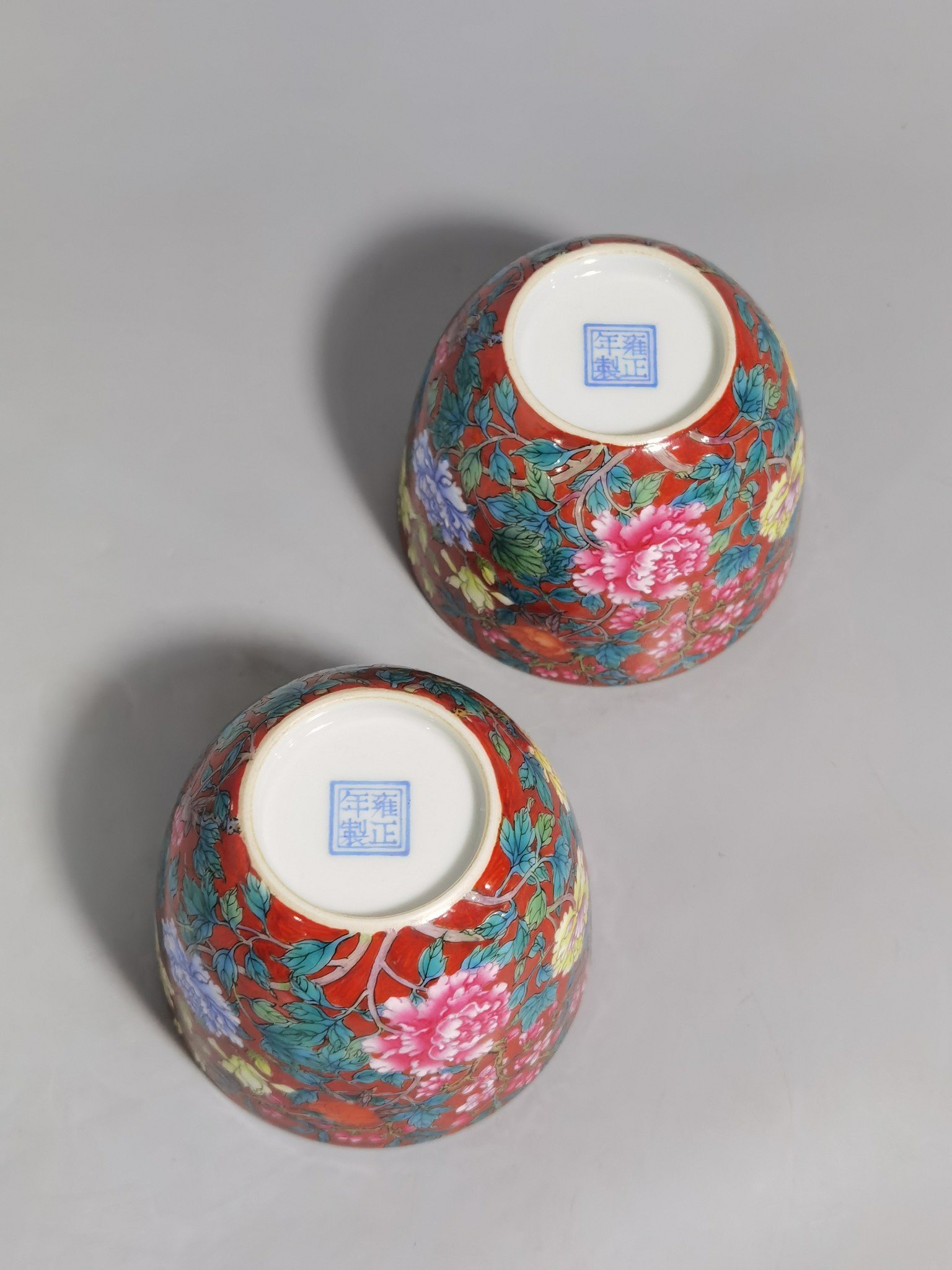 Qing Dynasty Yongzheng a pair of coral red pastel peony flower cups