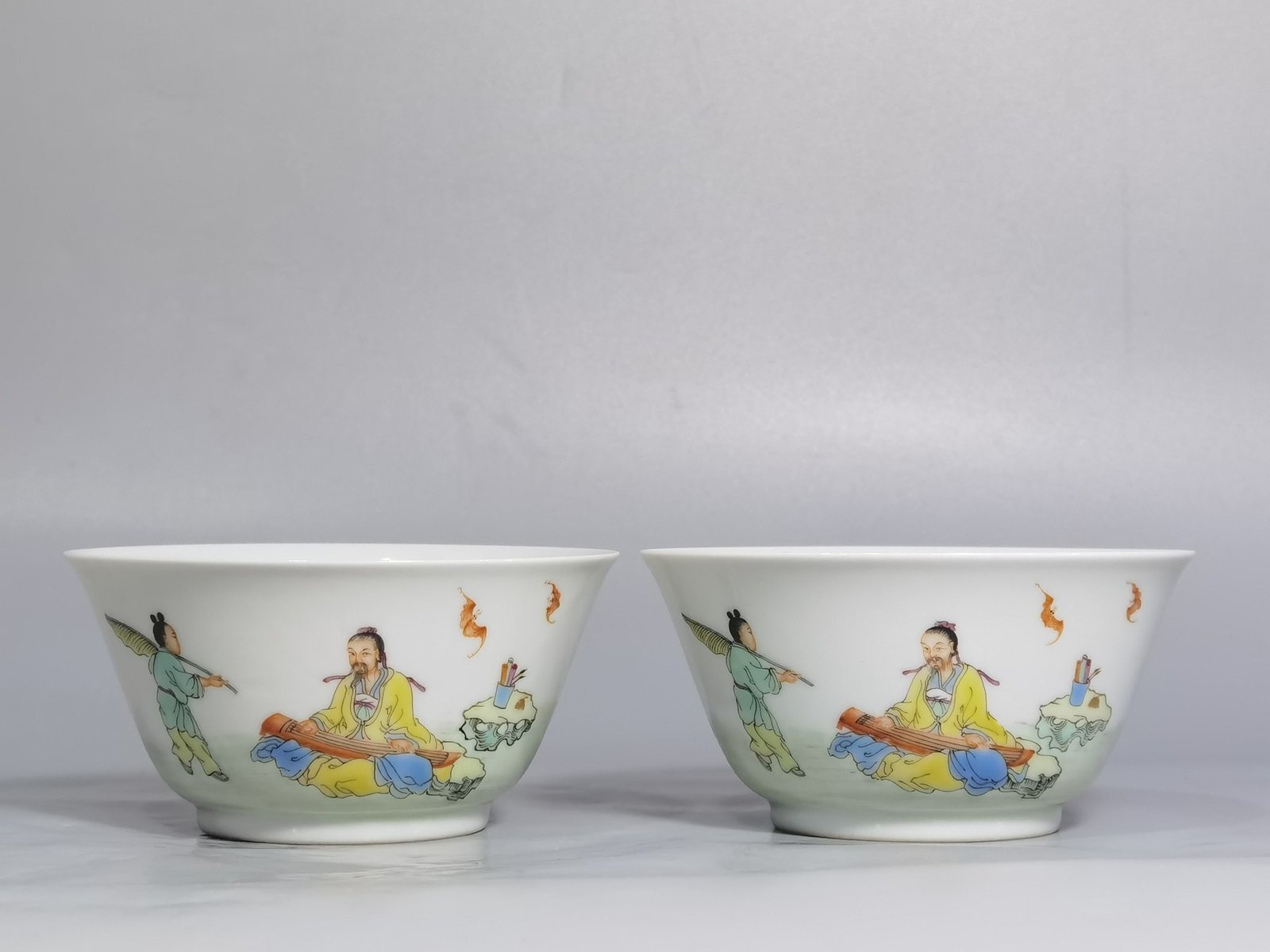 Qing Dynasty Yongzheng pastel color visiting friends with a musical instrument