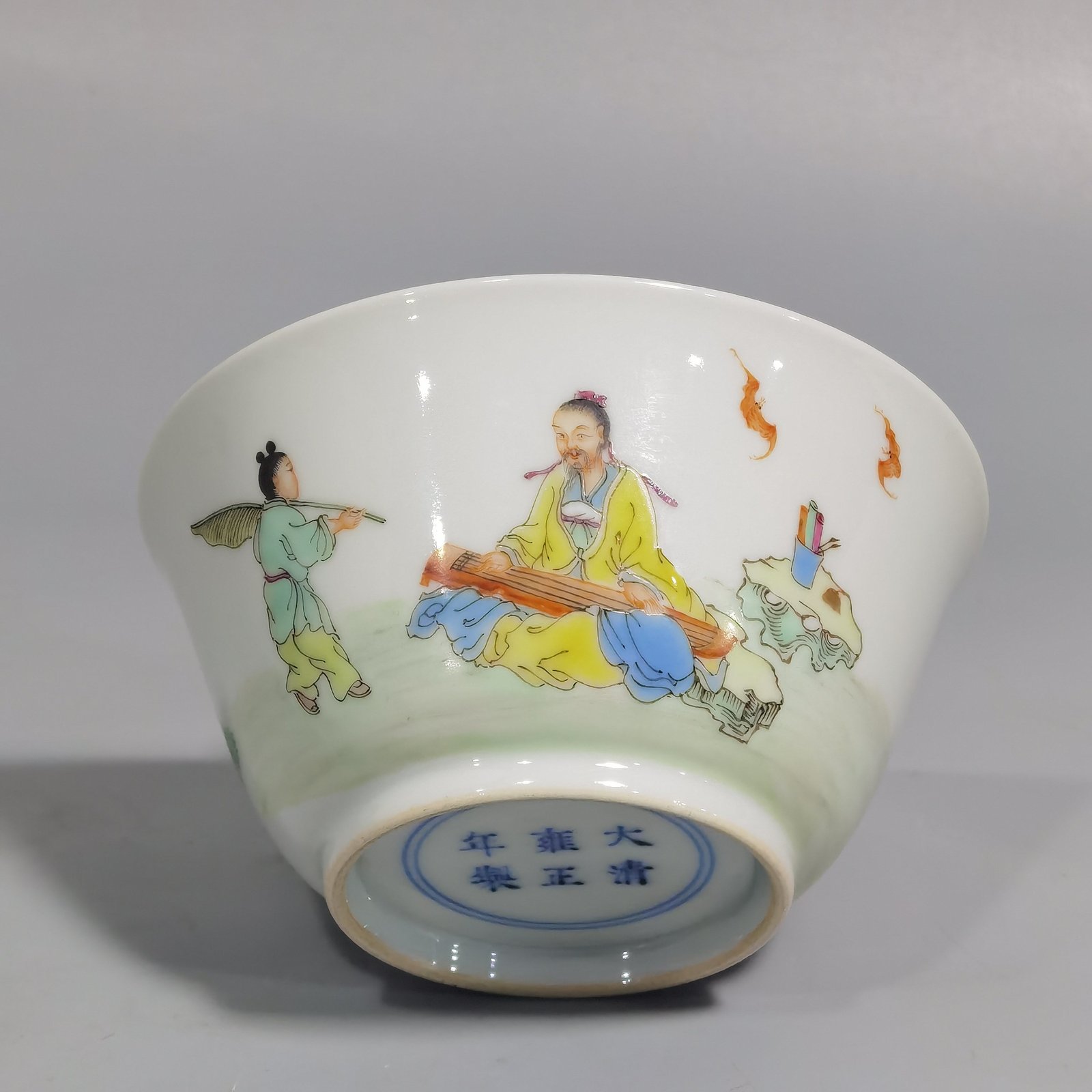 Qing Dynasty Yongzheng pastel color visiting friends with a musical instrument