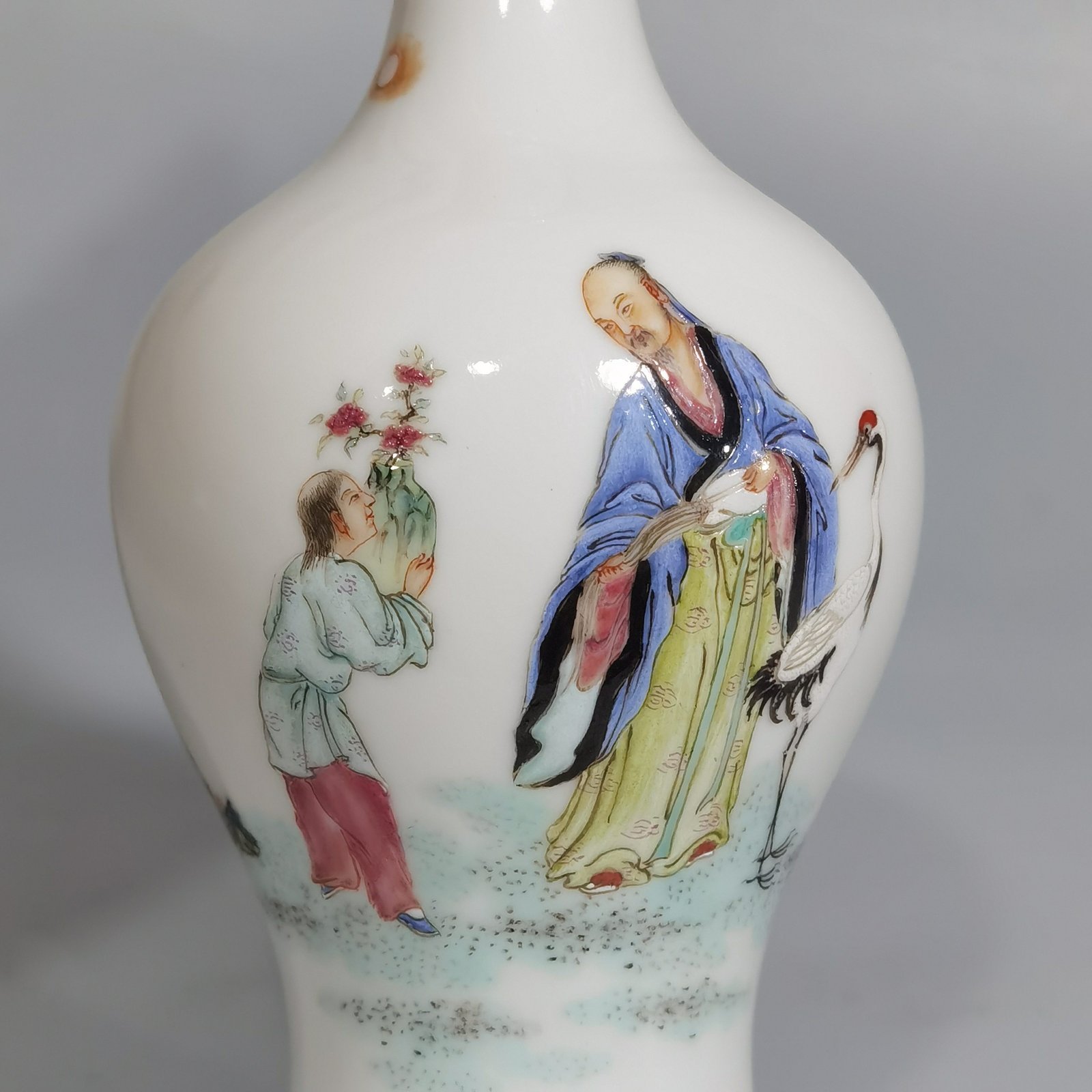 Qing Dynasty Yongzheng pastel color plum blossoms and raises cranes olive vase