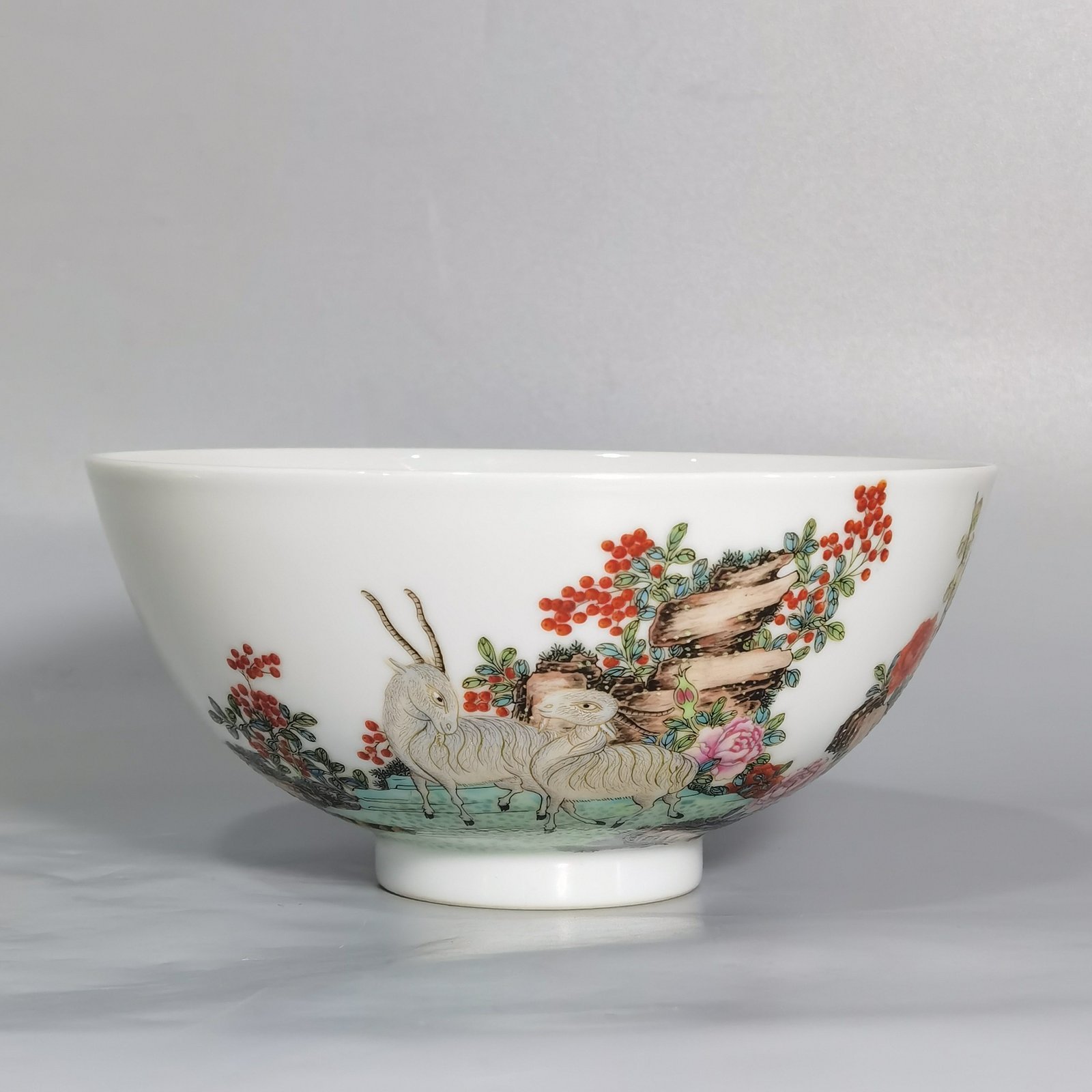 Qing Dynasty Yongzheng famille rose kaitai bowl with three sheep