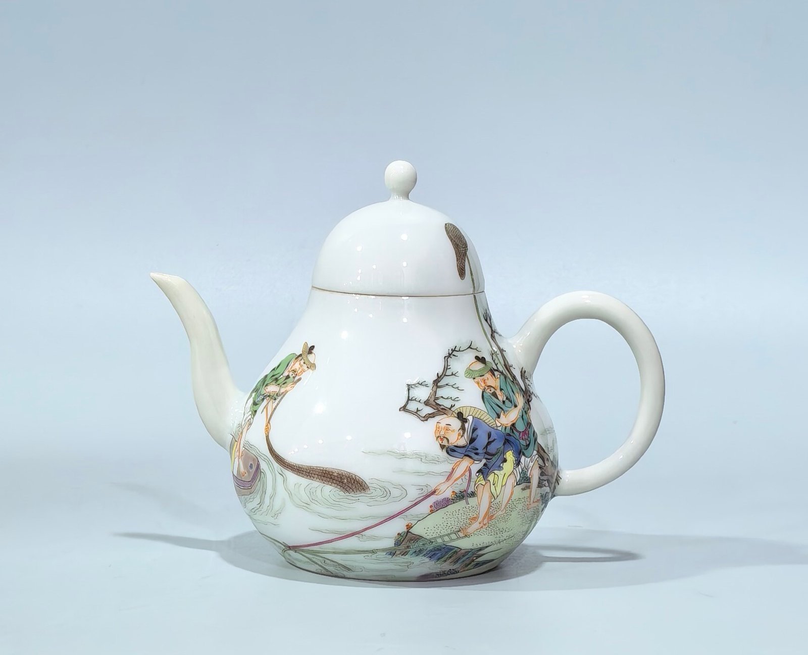 Qing Dynasty Yongzheng pastel teapot with figures