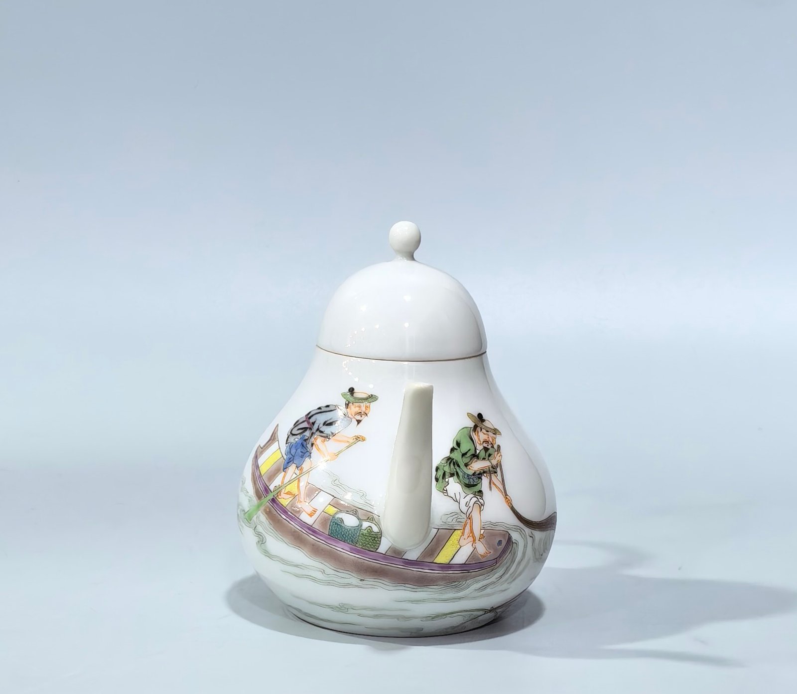 Qing Dynasty Yongzheng pastel teapot with figures