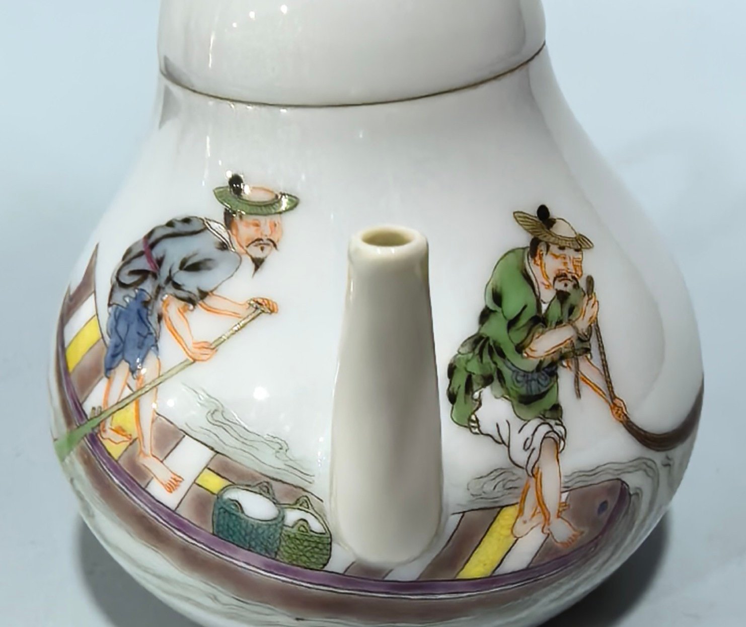 Qing Dynasty Yongzheng pastel teapot with figures