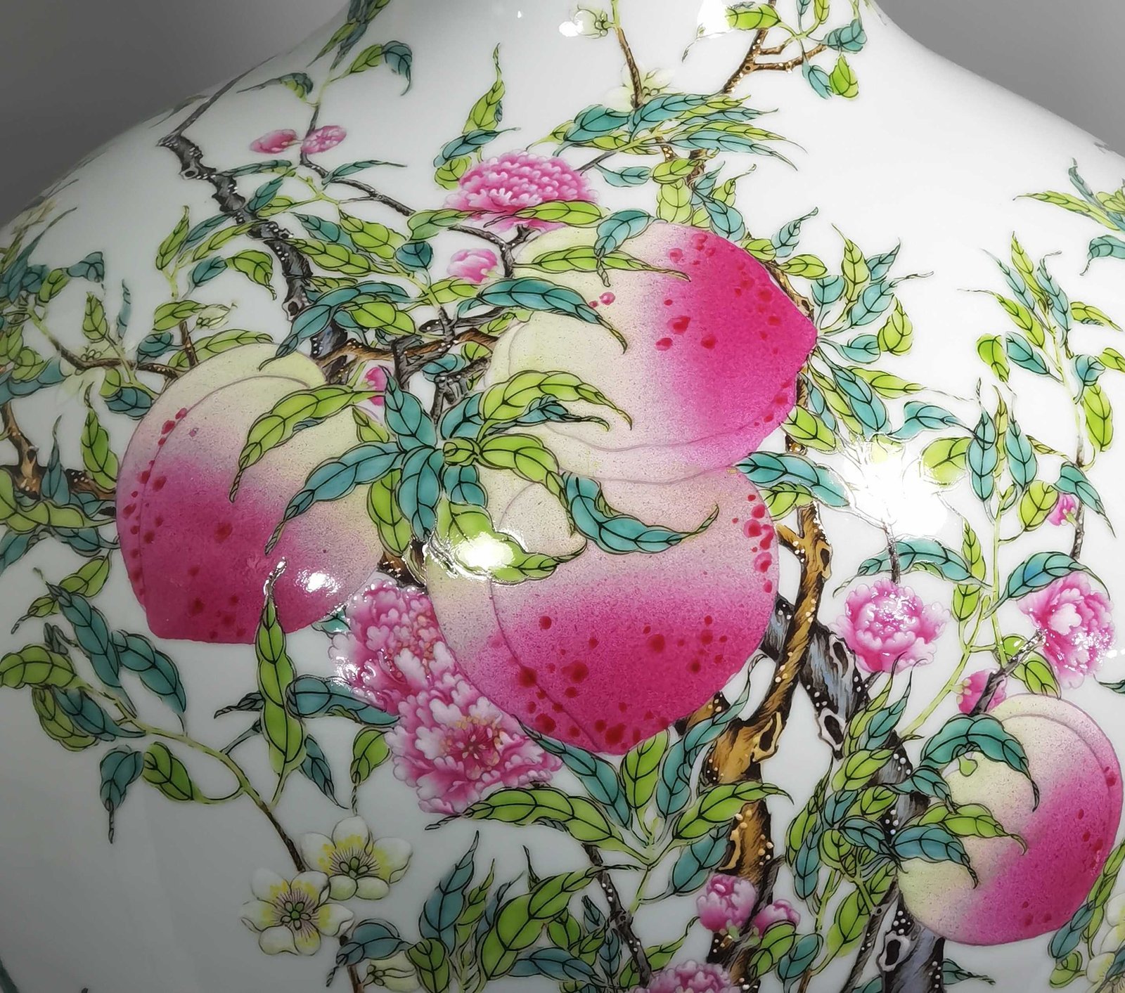Qing Dynasty Yongzheng famille rose eight peach celestial sphere vase