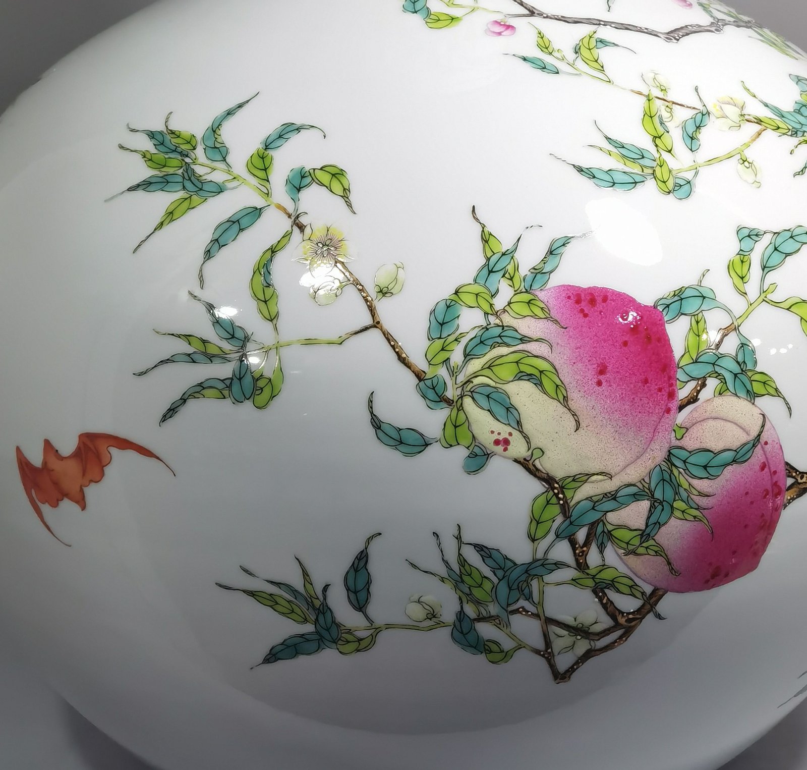 Qing Dynasty Yongzheng famille rose eight peach celestial sphere vase