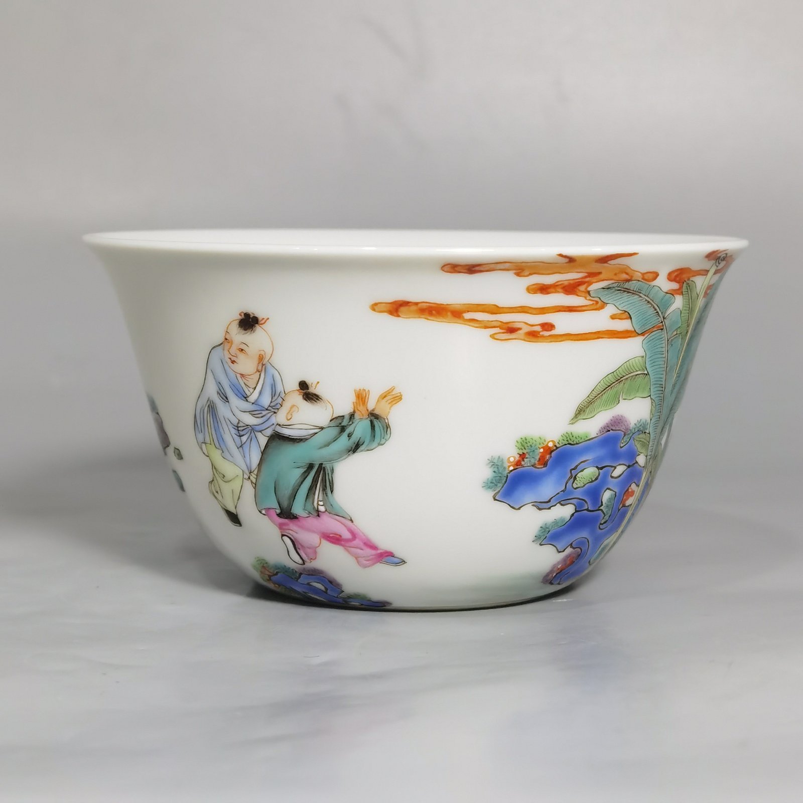 Qing Dynasty Yongzheng famille rose Sima Guang smashed cylinder horseshoe cup