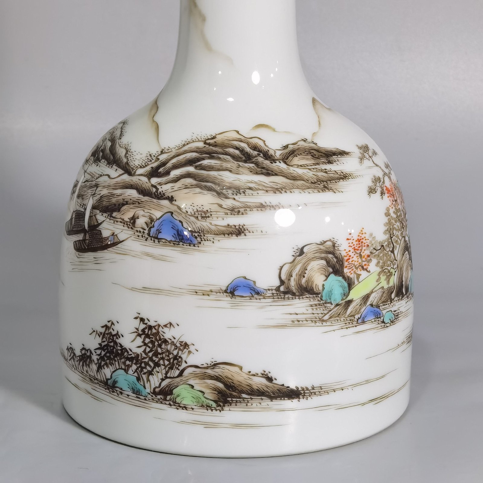 Qing Dynasty Yongzheng pastel landscape figure rattle statue