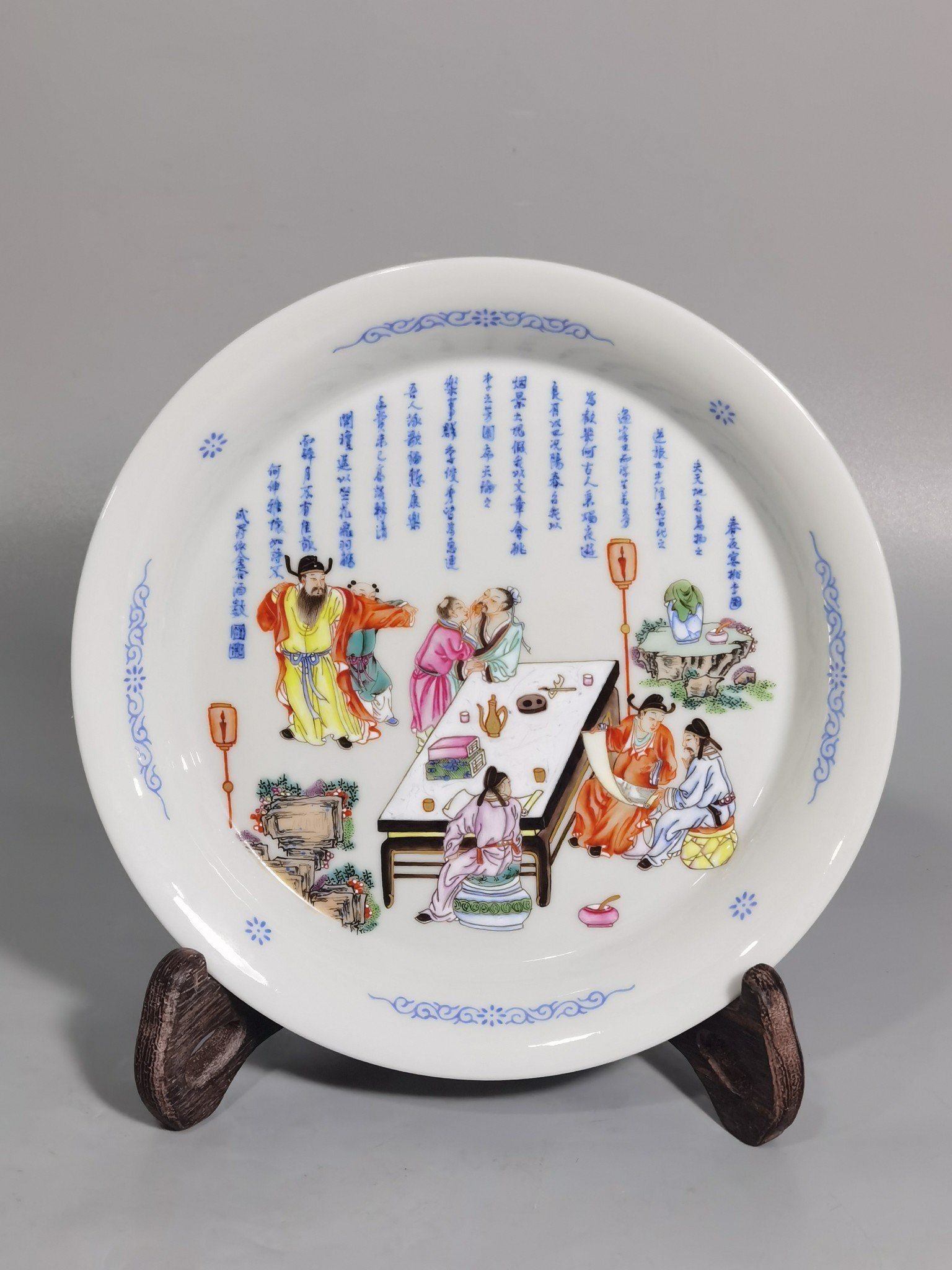 Qing Dynasty Yongzheng famille rose peach forest night banquet picture appreciation plate