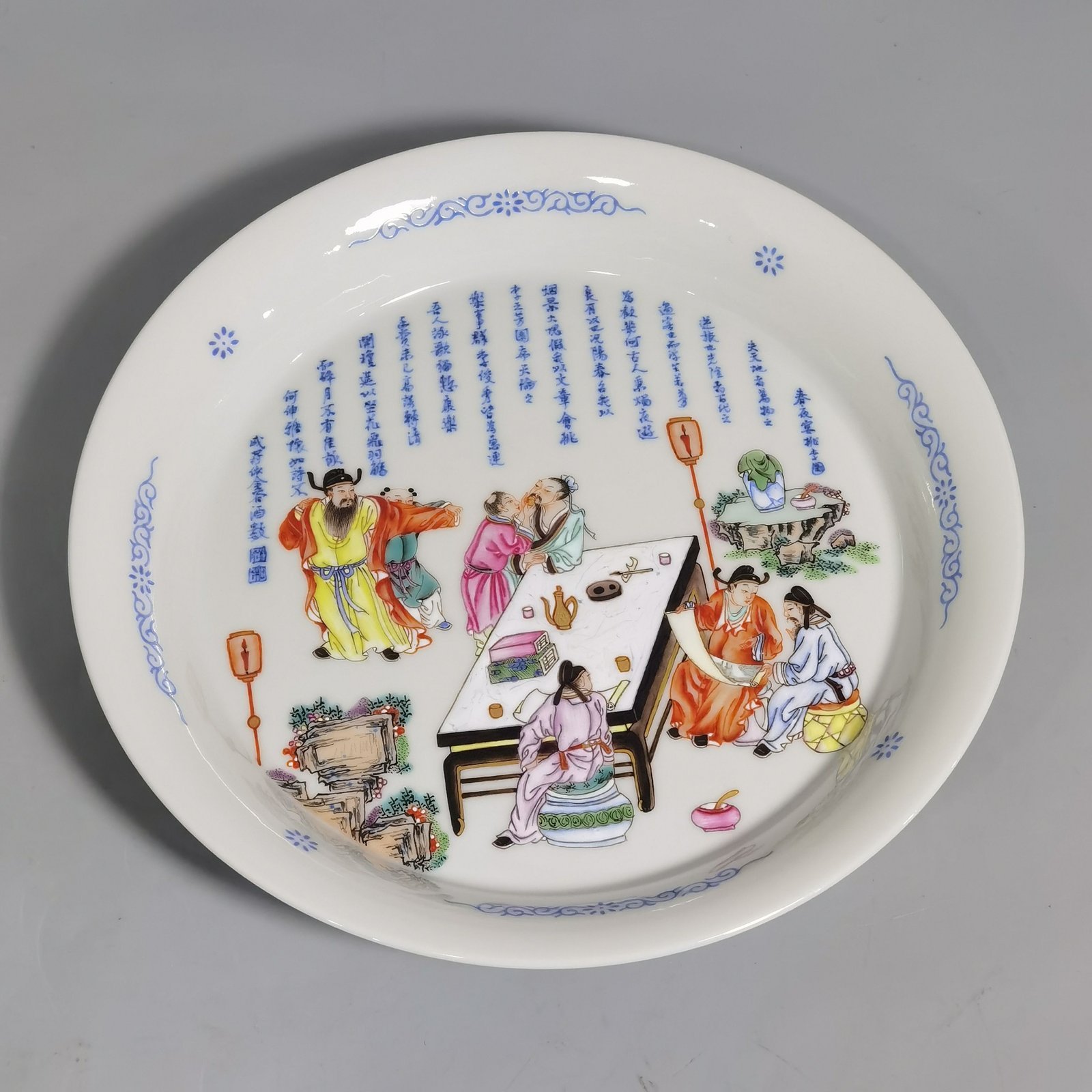 Qing Dynasty Yongzheng famille rose peach forest night banquet picture appreciation plate