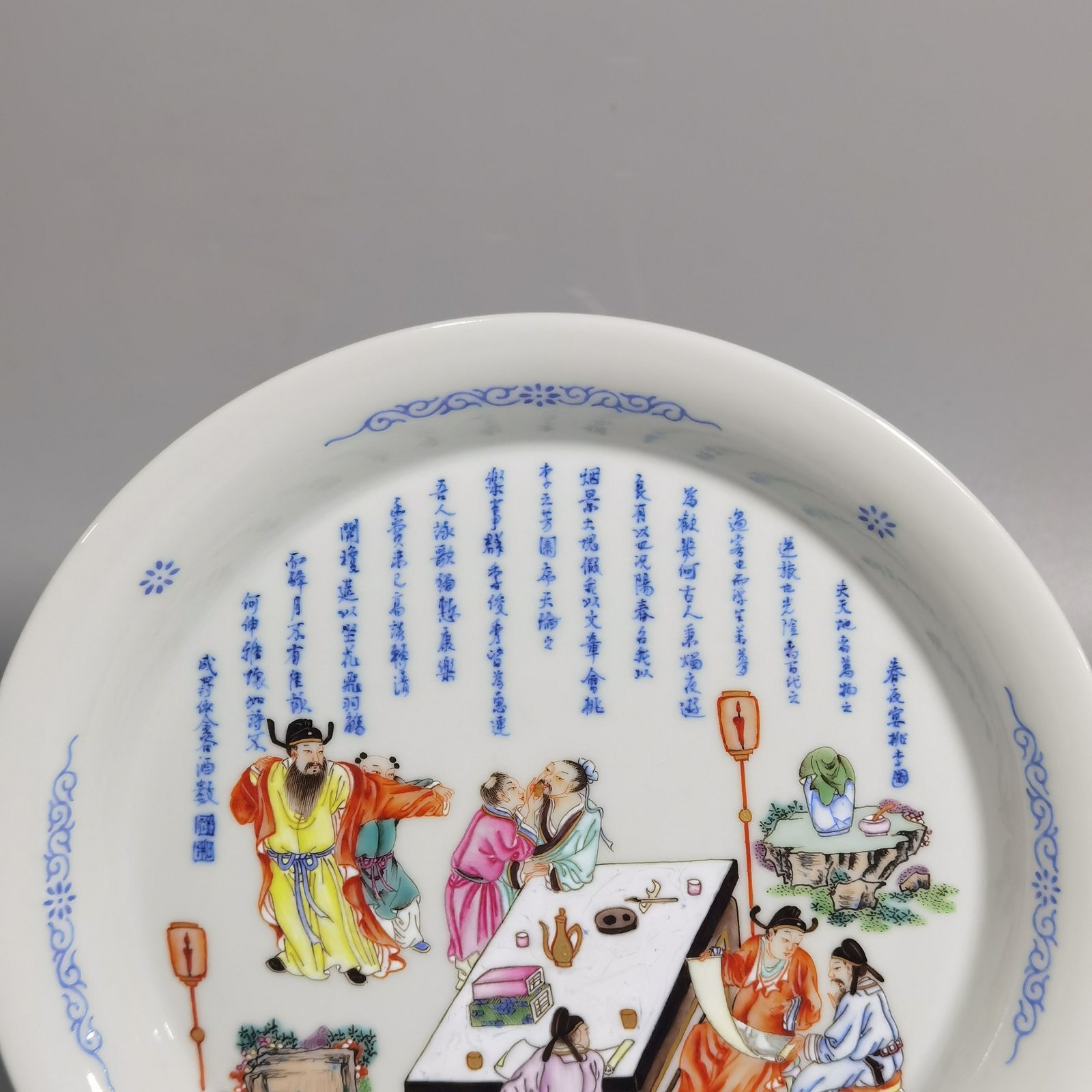 Qing Dynasty Yongzheng famille rose peach forest night banquet picture appreciation plate