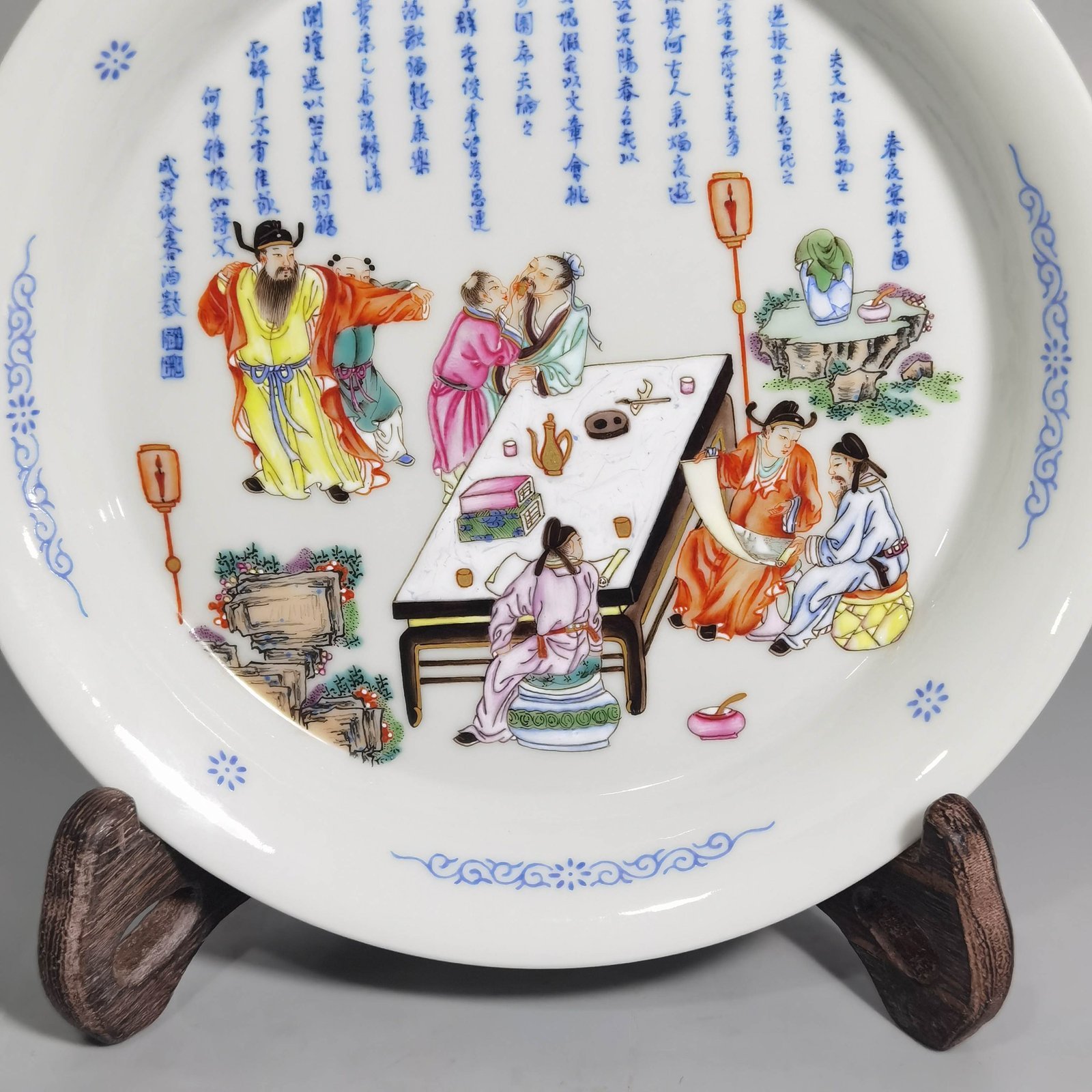 Qing Dynasty Yongzheng famille rose peach forest night banquet picture appreciation plate