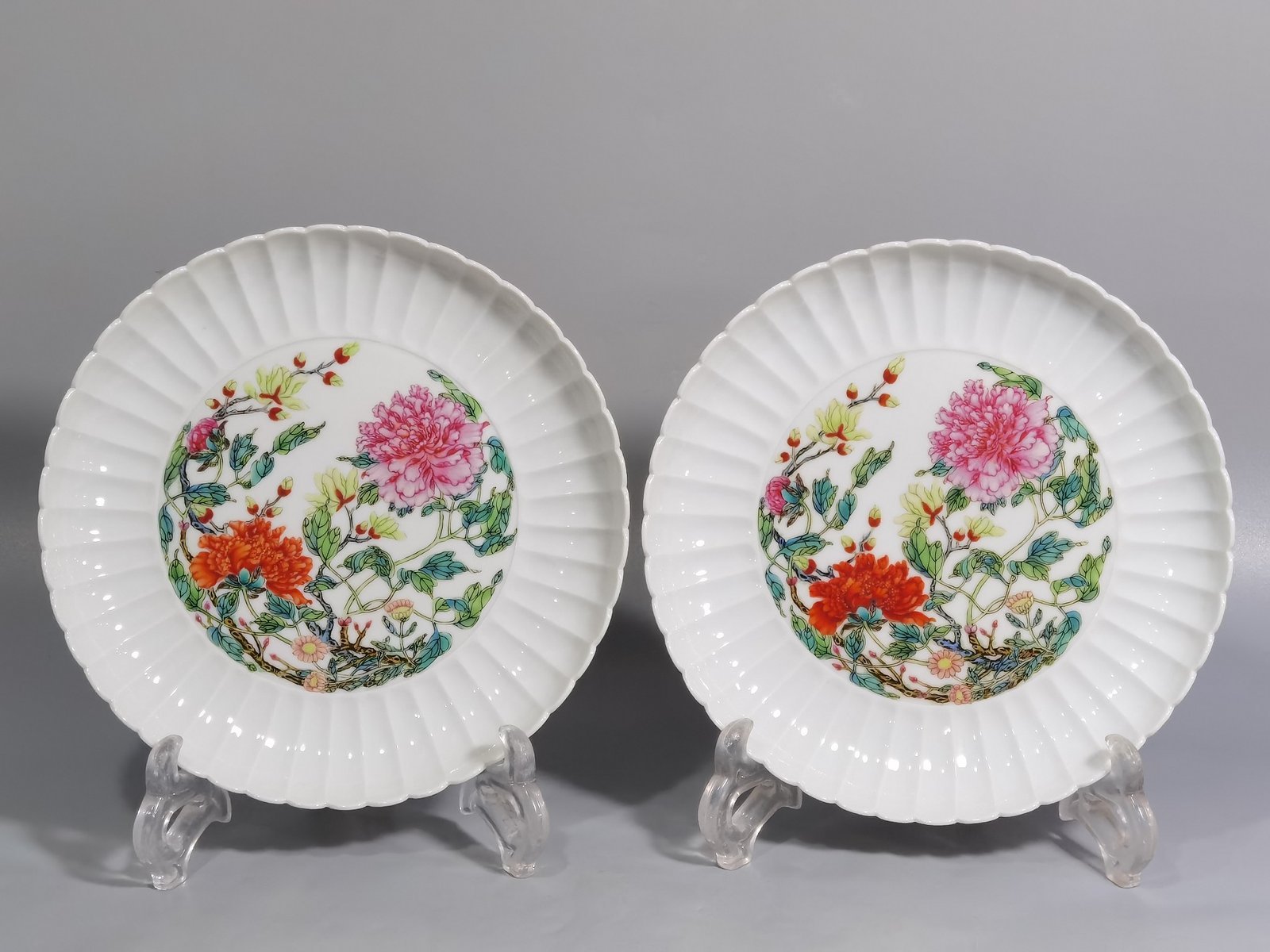 Qing Dynasty Yongzheng pair of plates with pastel peonies and floral patterns