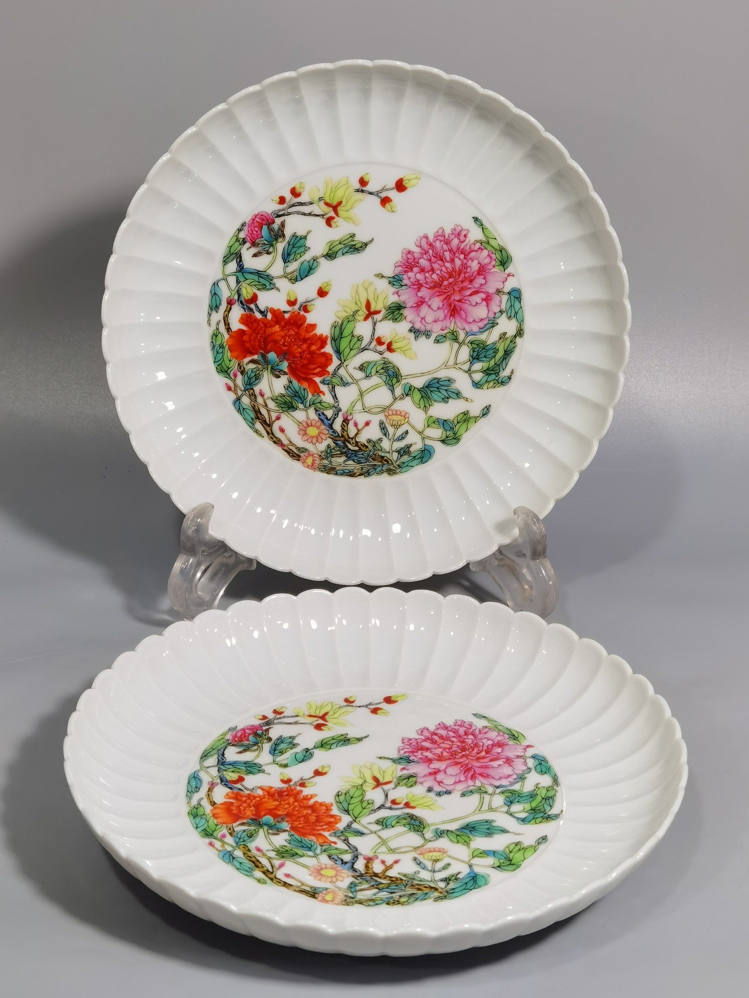 Qing Dynasty Yongzheng pair of plates with pastel peonies and floral patterns