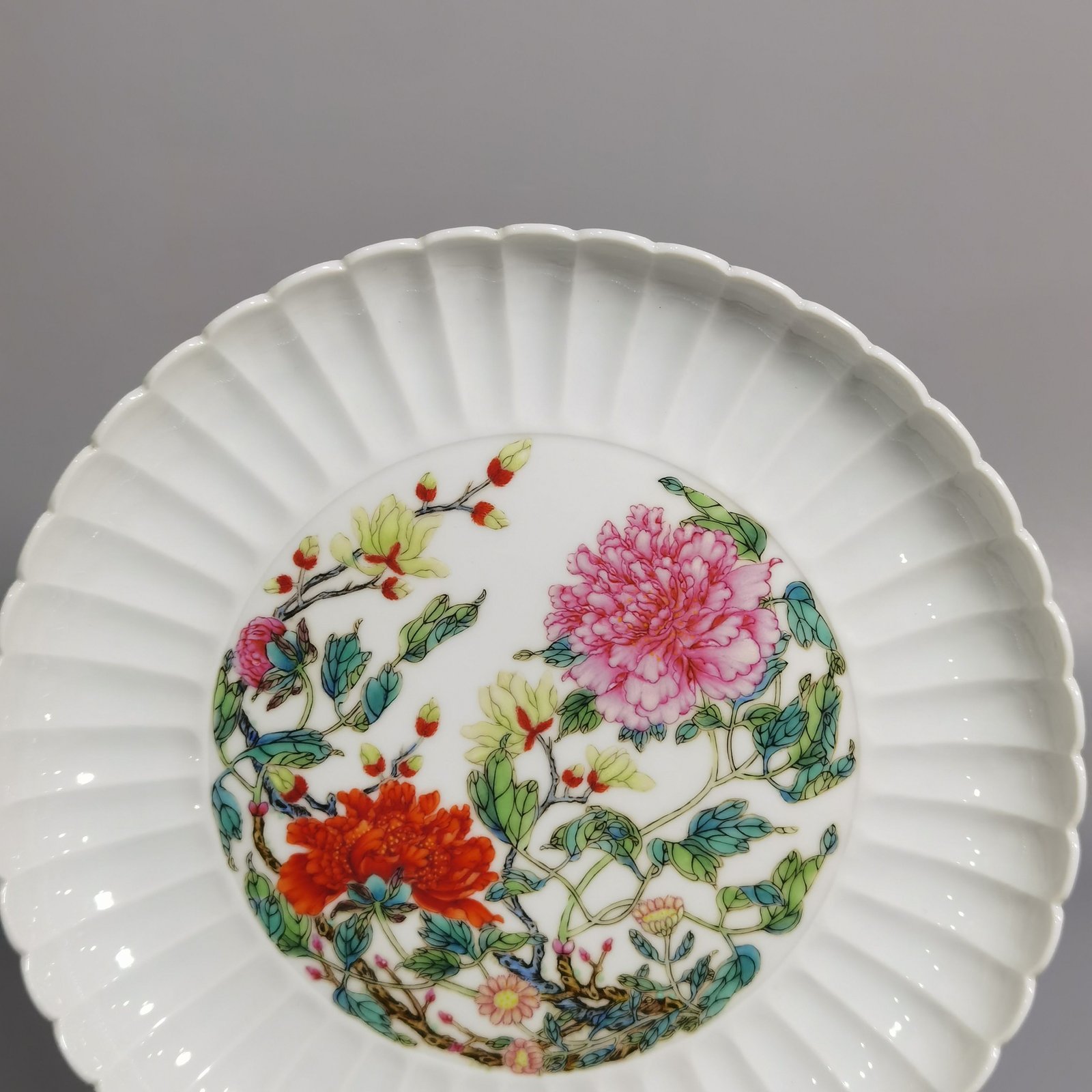 Qing Dynasty Yongzheng pair of plates with pastel peonies and floral patterns