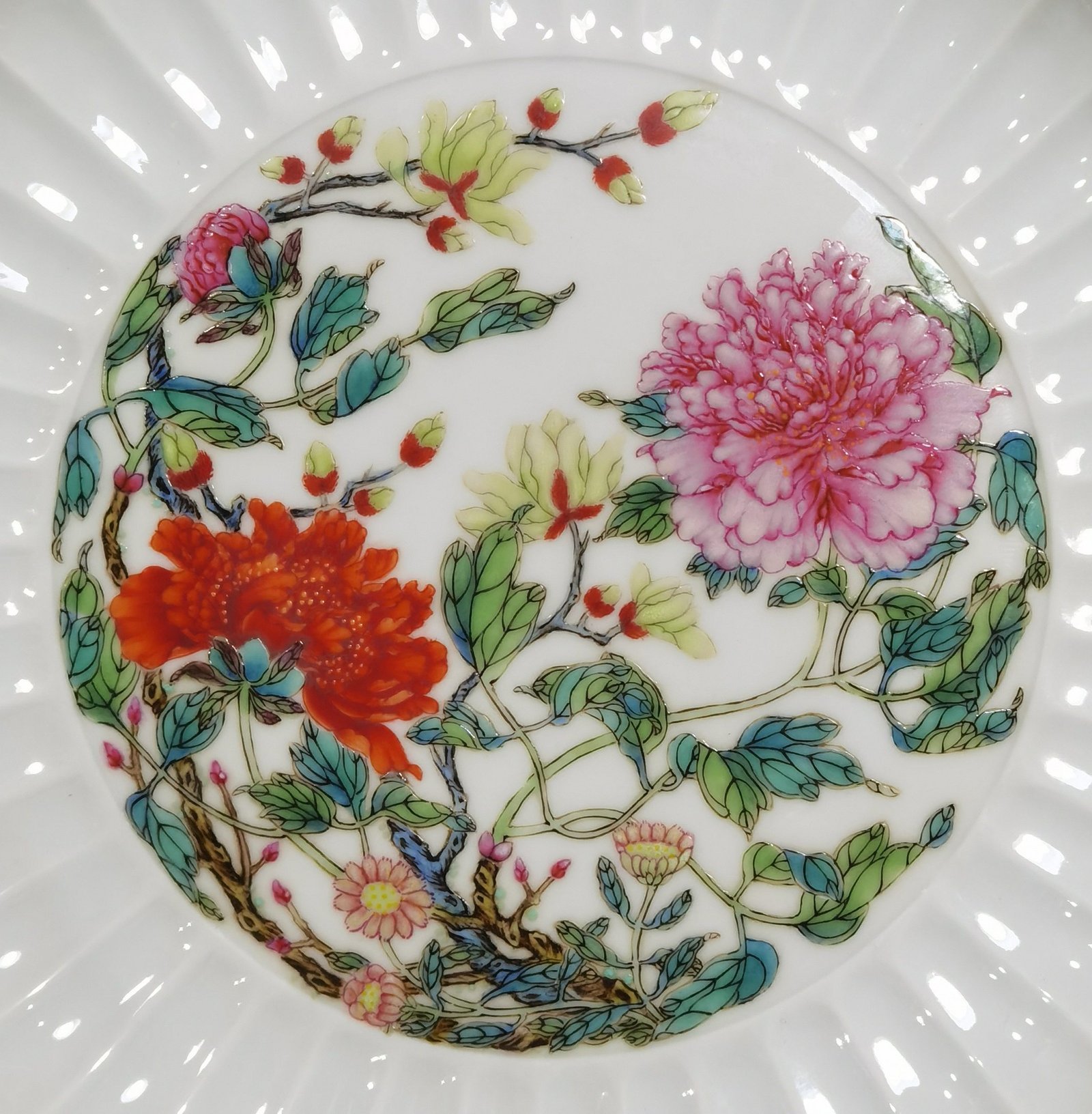 Qing Dynasty Yongzheng pair of plates with pastel peonies and floral patterns