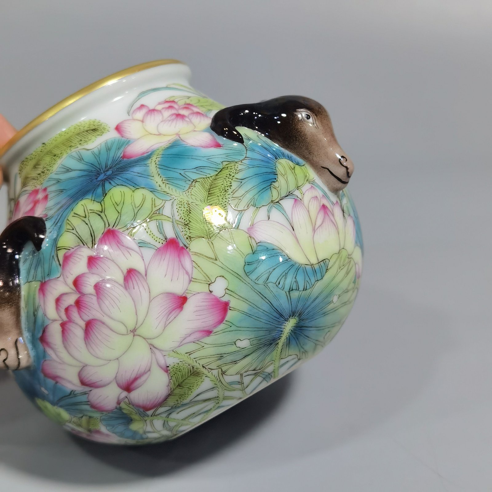Qing Dynasty Yongzheng pastel lotus three-goat wash
