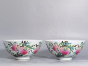 Qing Dynasty Yongzheng pair of famille rose six-peach and five-blessing bowl