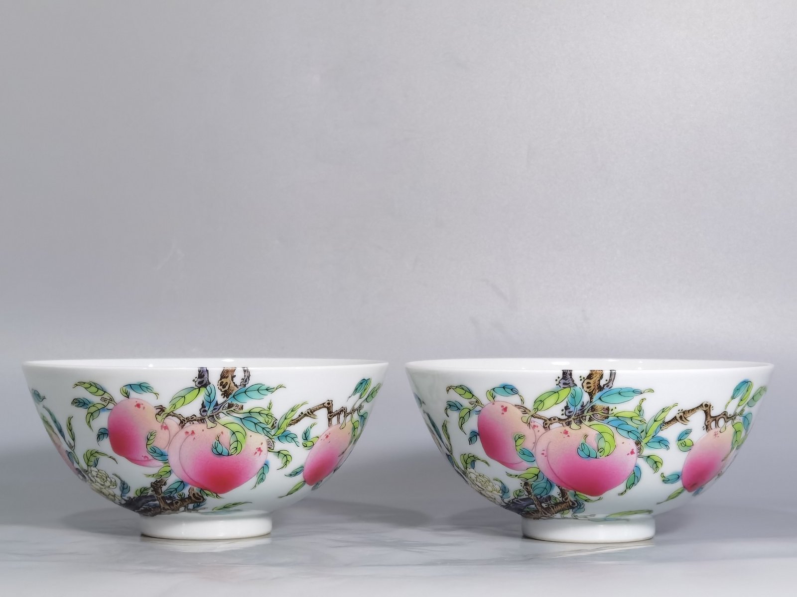 Qing Dynasty Yongzheng pair of famille rose six-peach and five-blessing bowl