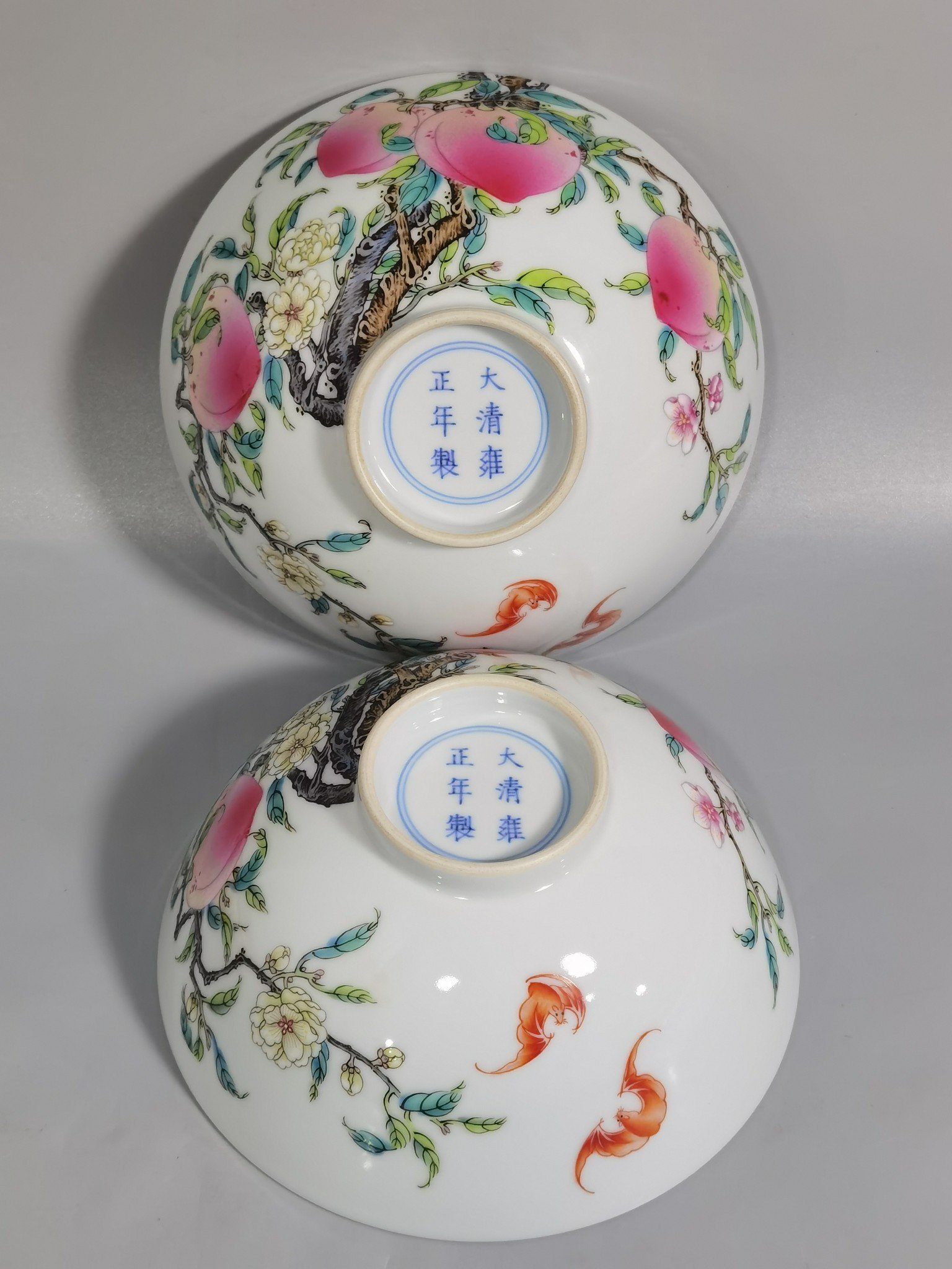 Qing Dynasty Yongzheng pair of famille rose six-peach and five-blessing bowl