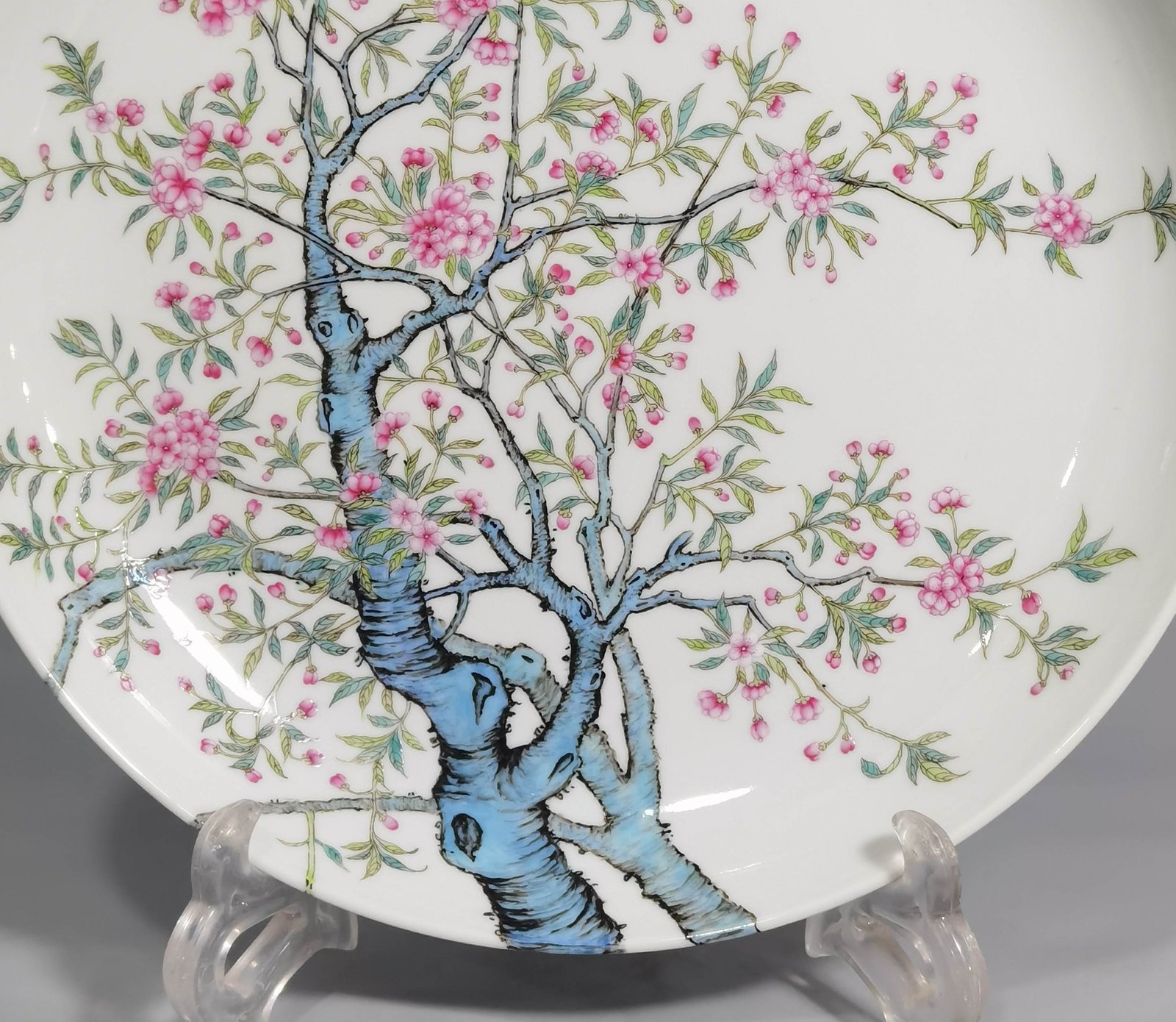 Qing Dynasty Yongzheng pastel peach blossom poem appreciation plate