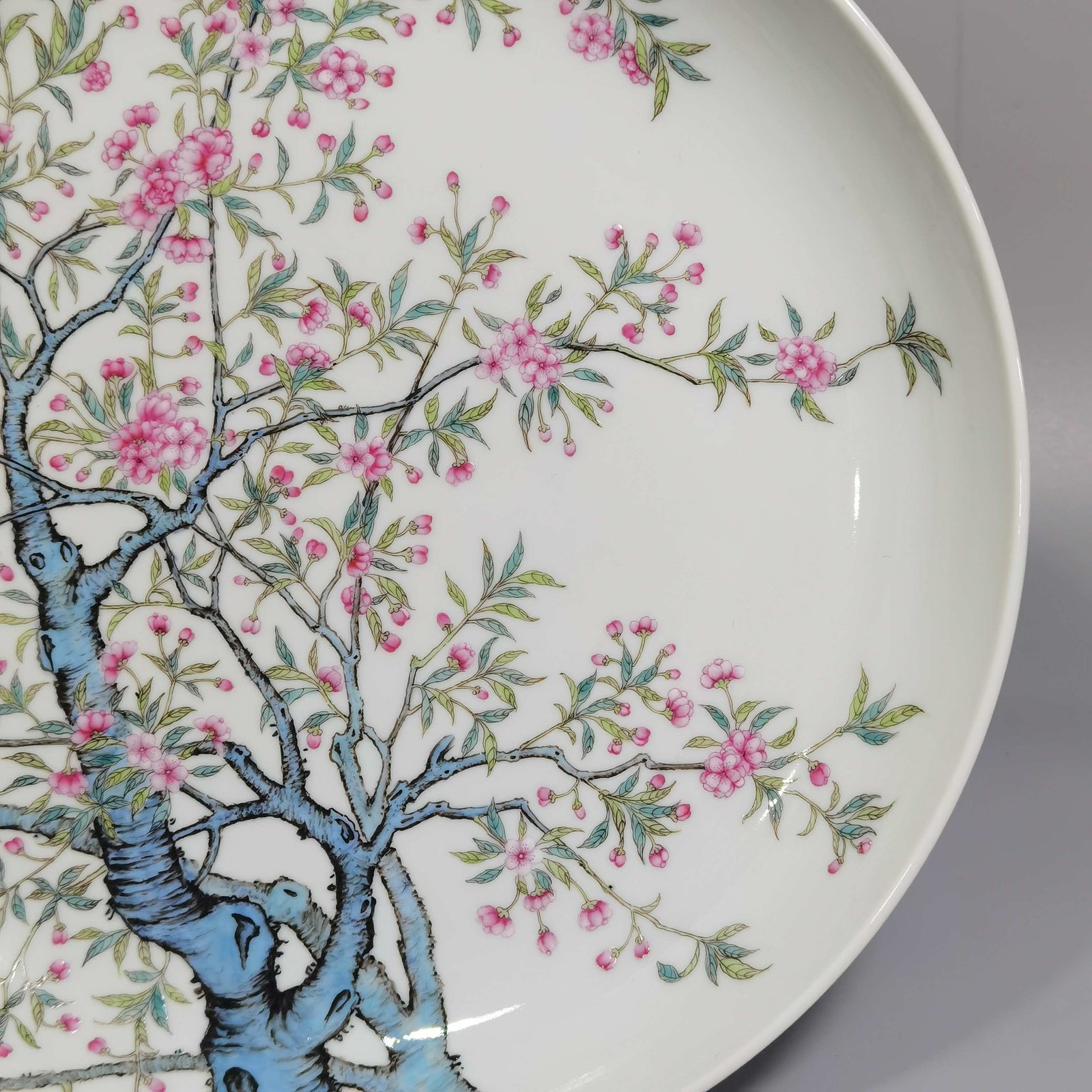 Qing Dynasty Yongzheng pastel peach blossom poem appreciation plate