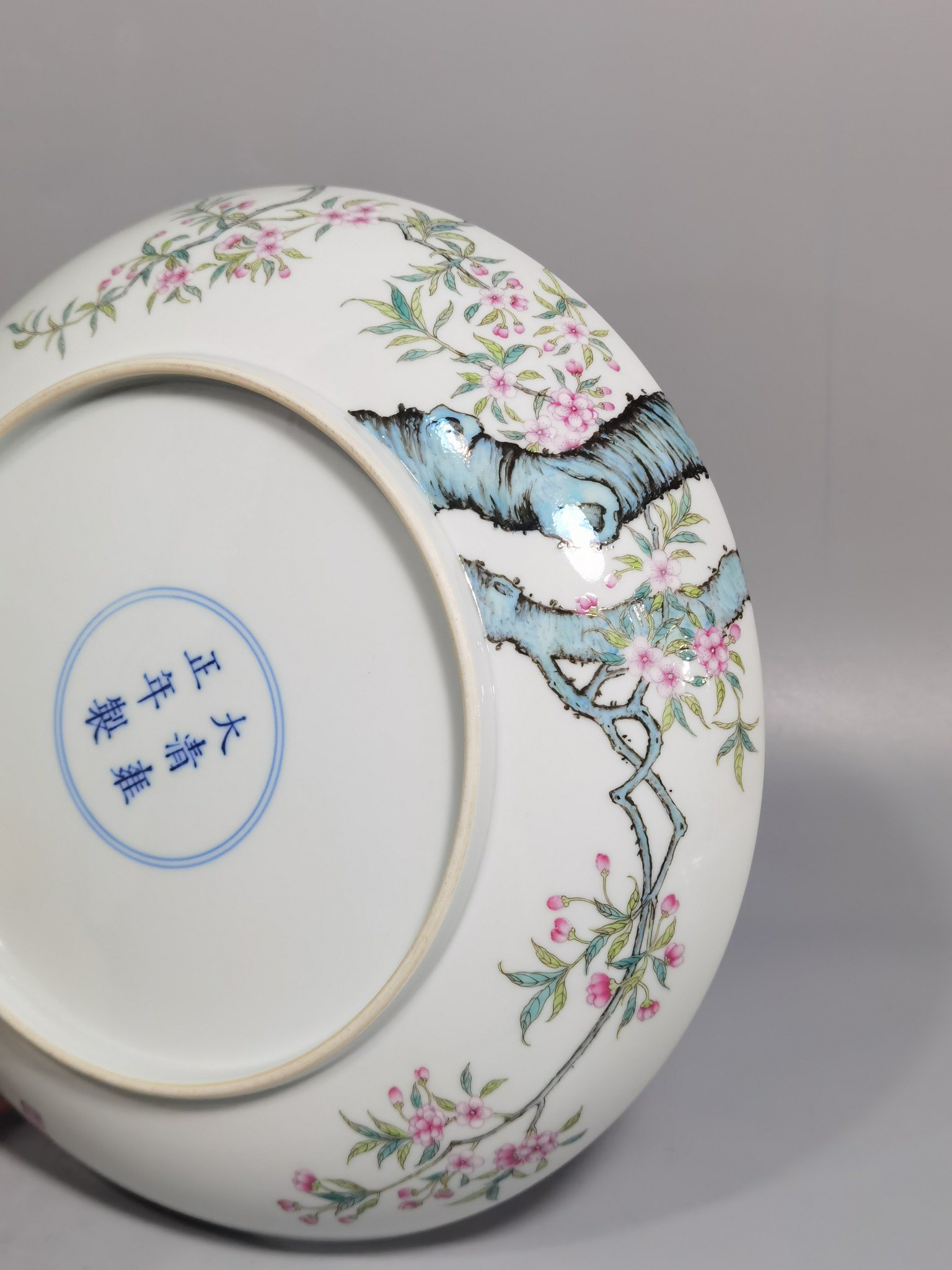 Qing Dynasty Yongzheng pastel peach blossom poem appreciation plate