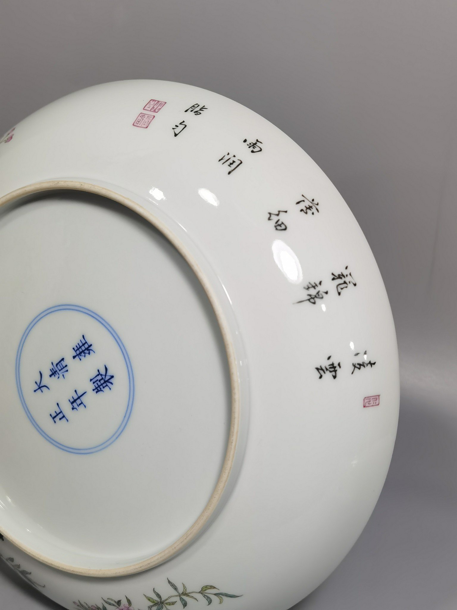 Qing Dynasty Yongzheng pastel peach blossom poem appreciation plate