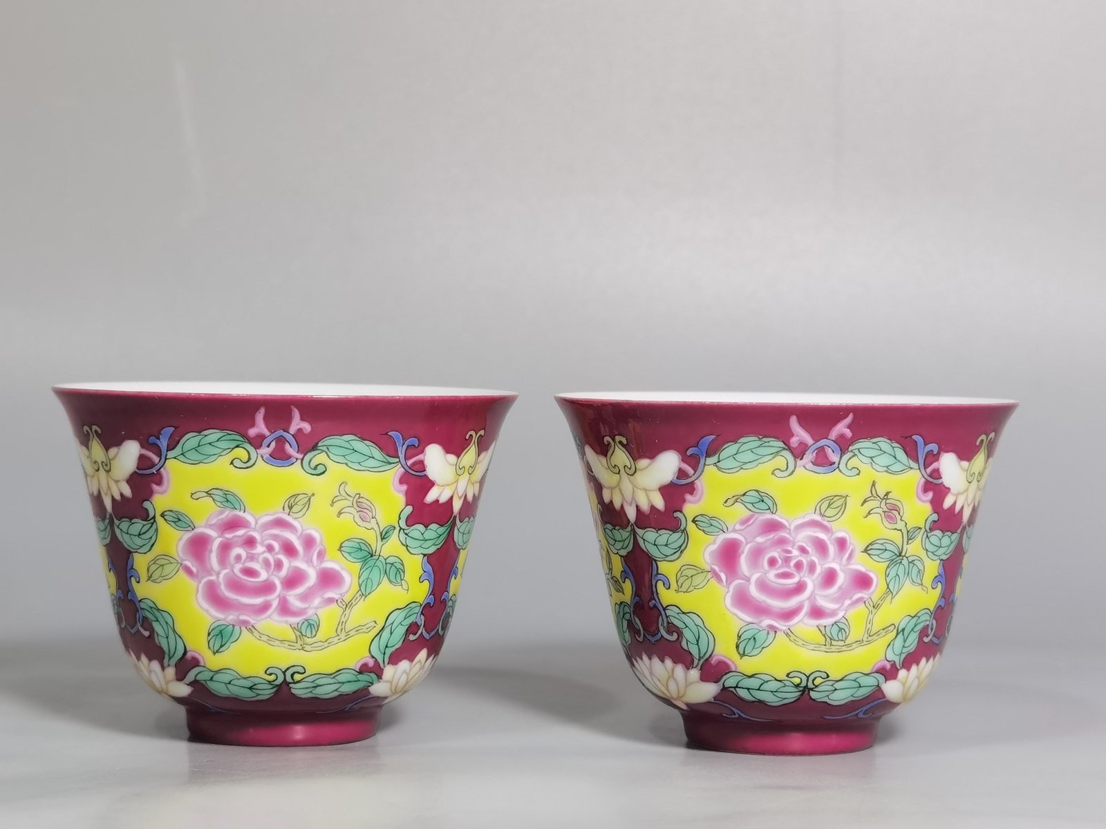 Qing Dynasty Yongzheng rouge ground Yangcai consecrated rose pattern cup