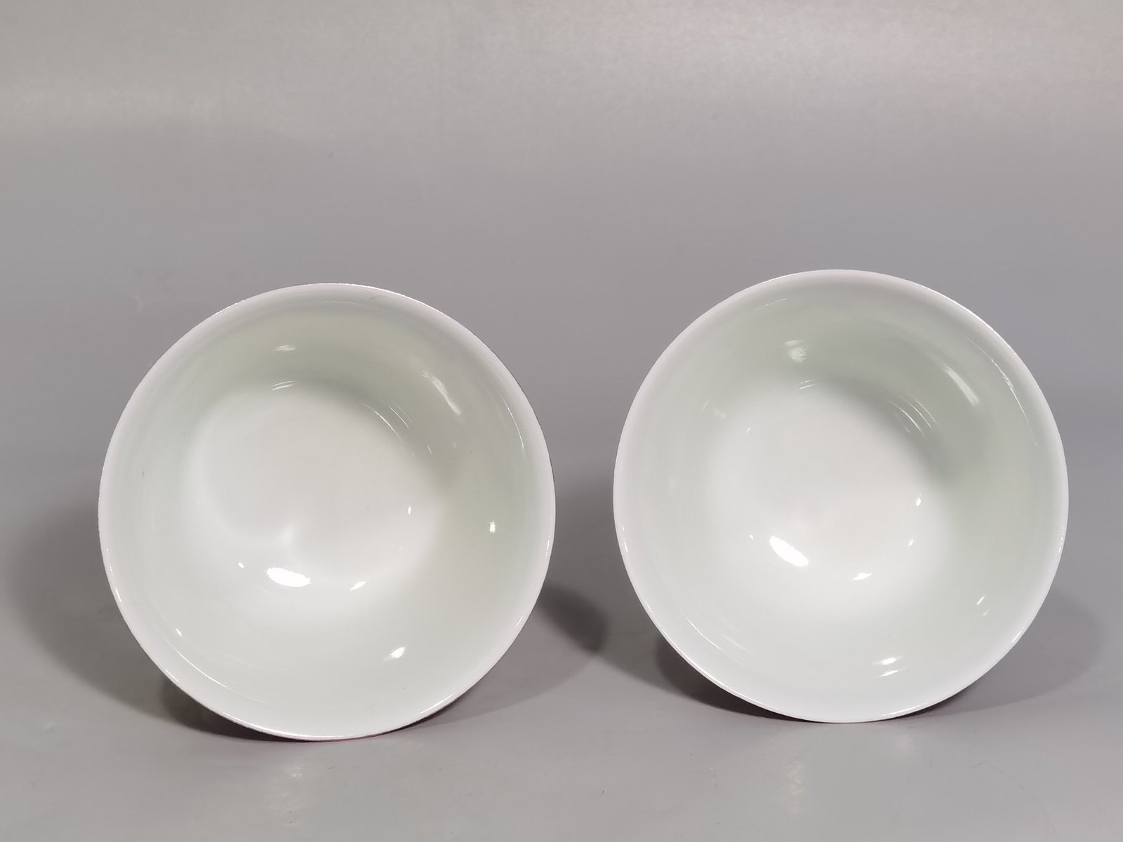 Qing Dynasty Yongzheng rouge ground Yangcai consecrated rose pattern cup