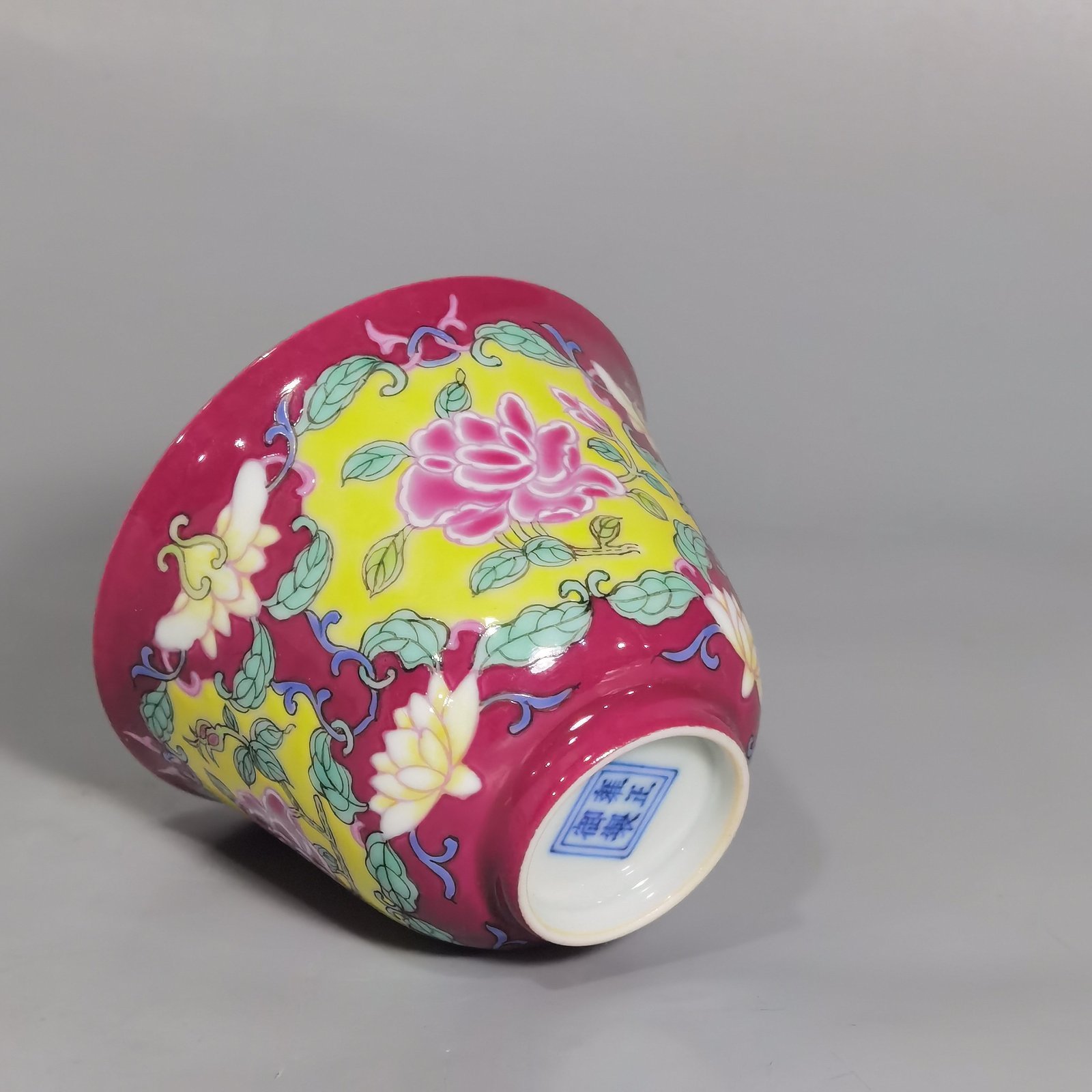 Qing Dynasty Yongzheng rouge ground Yangcai consecrated rose pattern cup