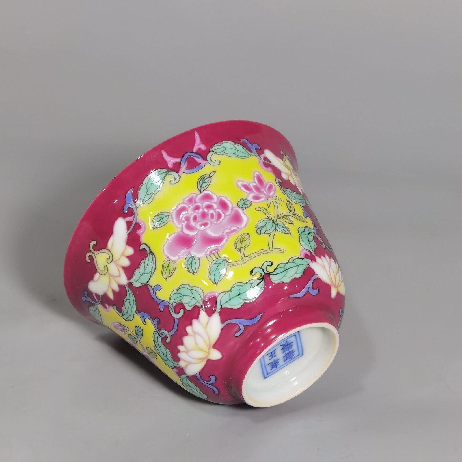 Qing Dynasty Yongzheng rouge ground Yangcai consecrated rose pattern cup